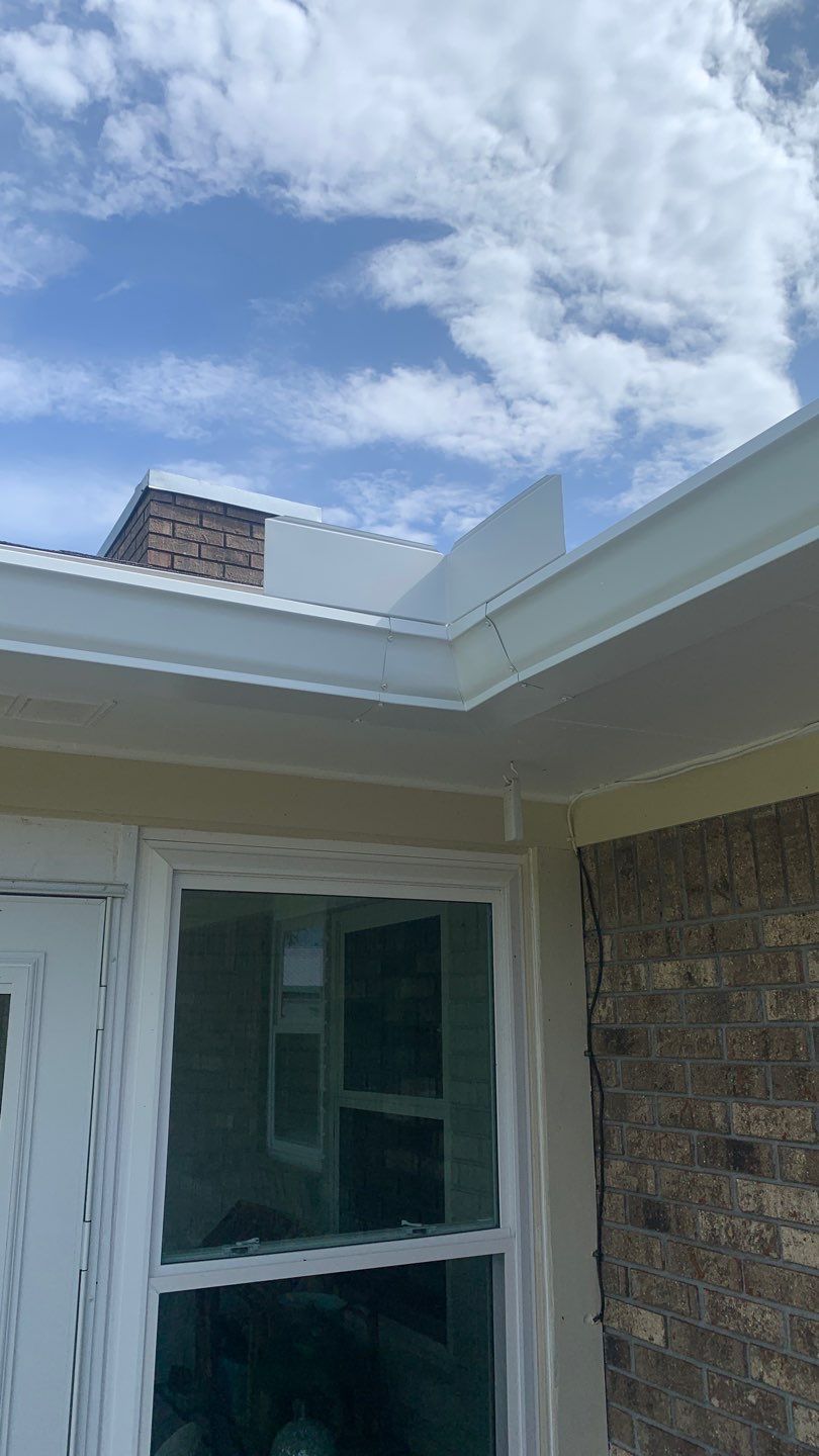Seamless Gutter Installation Using 6-Inch White K-Style Seamless Gutters by Gutter Professors