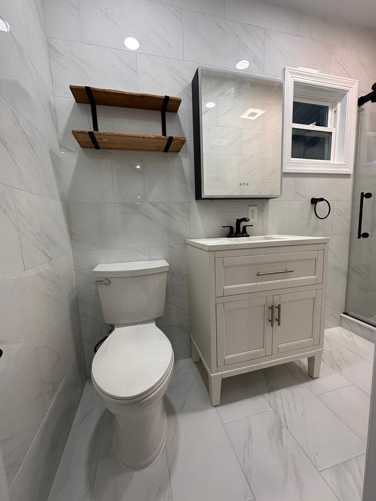 Bathroom Remodel using Tile by Home Concepts Construction