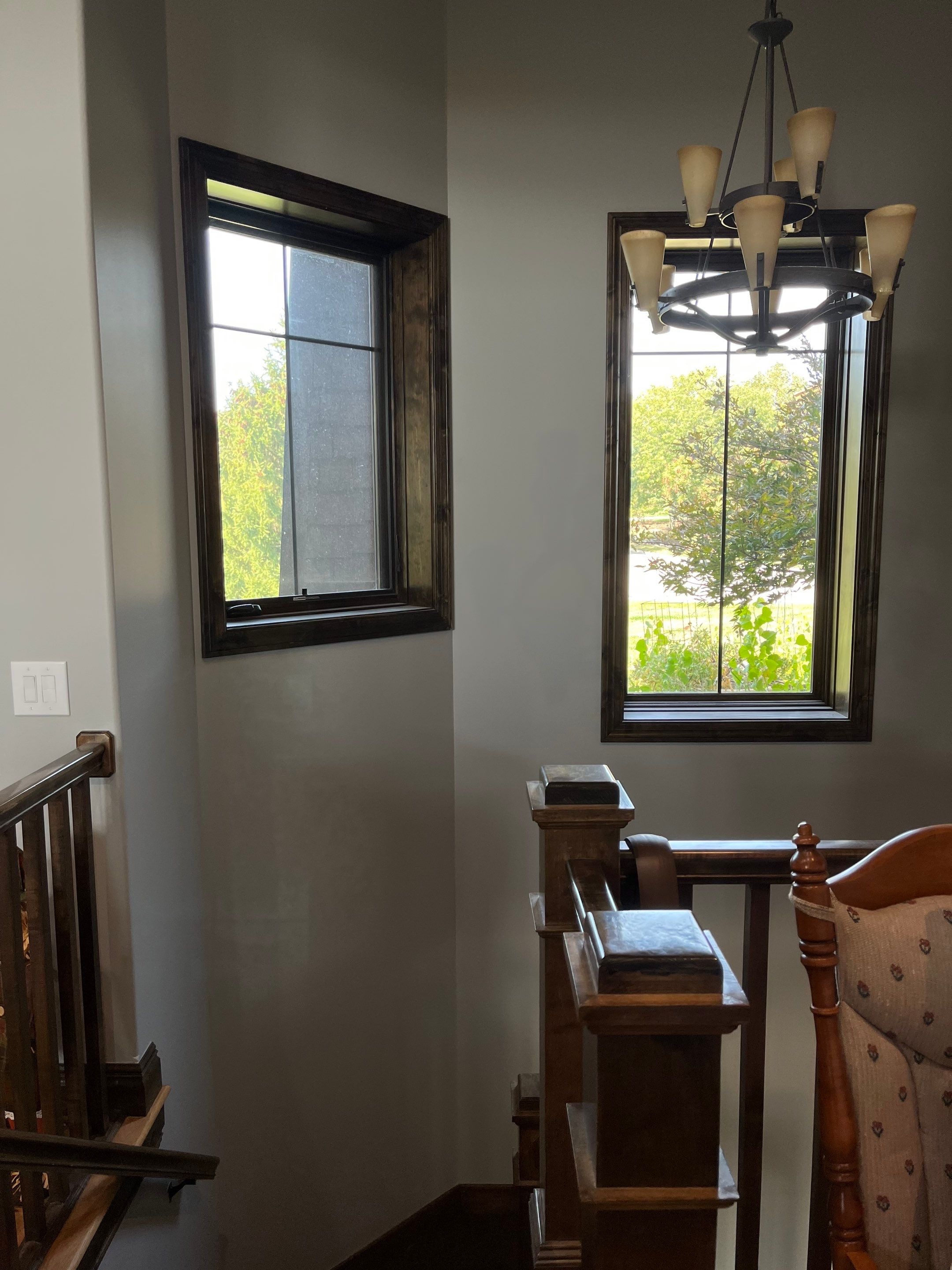 Motorized, Hunter Douglas Designer Screen Shades Above Stairs in Omaha Home by Custom Blinds & Design