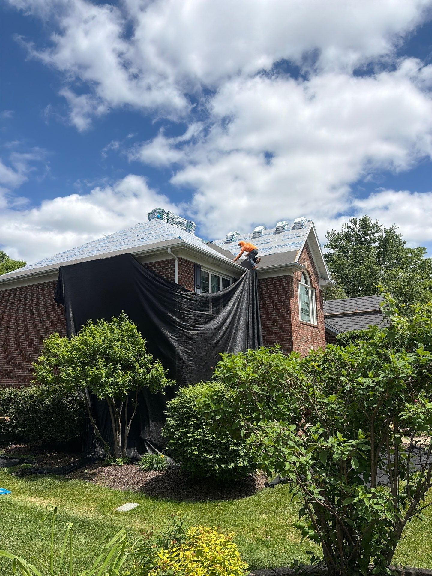 Asphalt Shingle Roof Replacement and Skylight Installation in Darien by Pro Home Services Inc