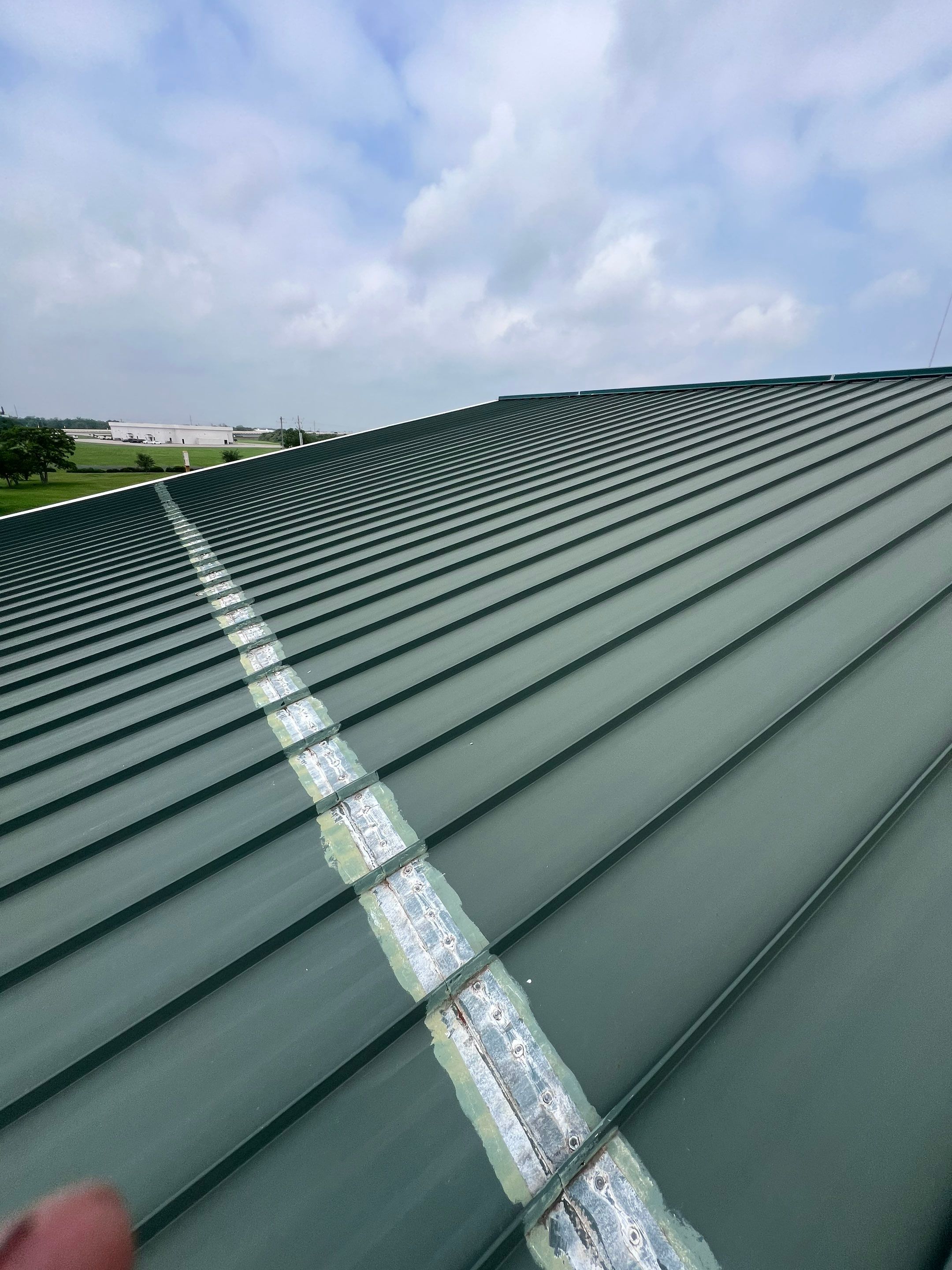 Hail Damage using Metal by Roof Repair Company