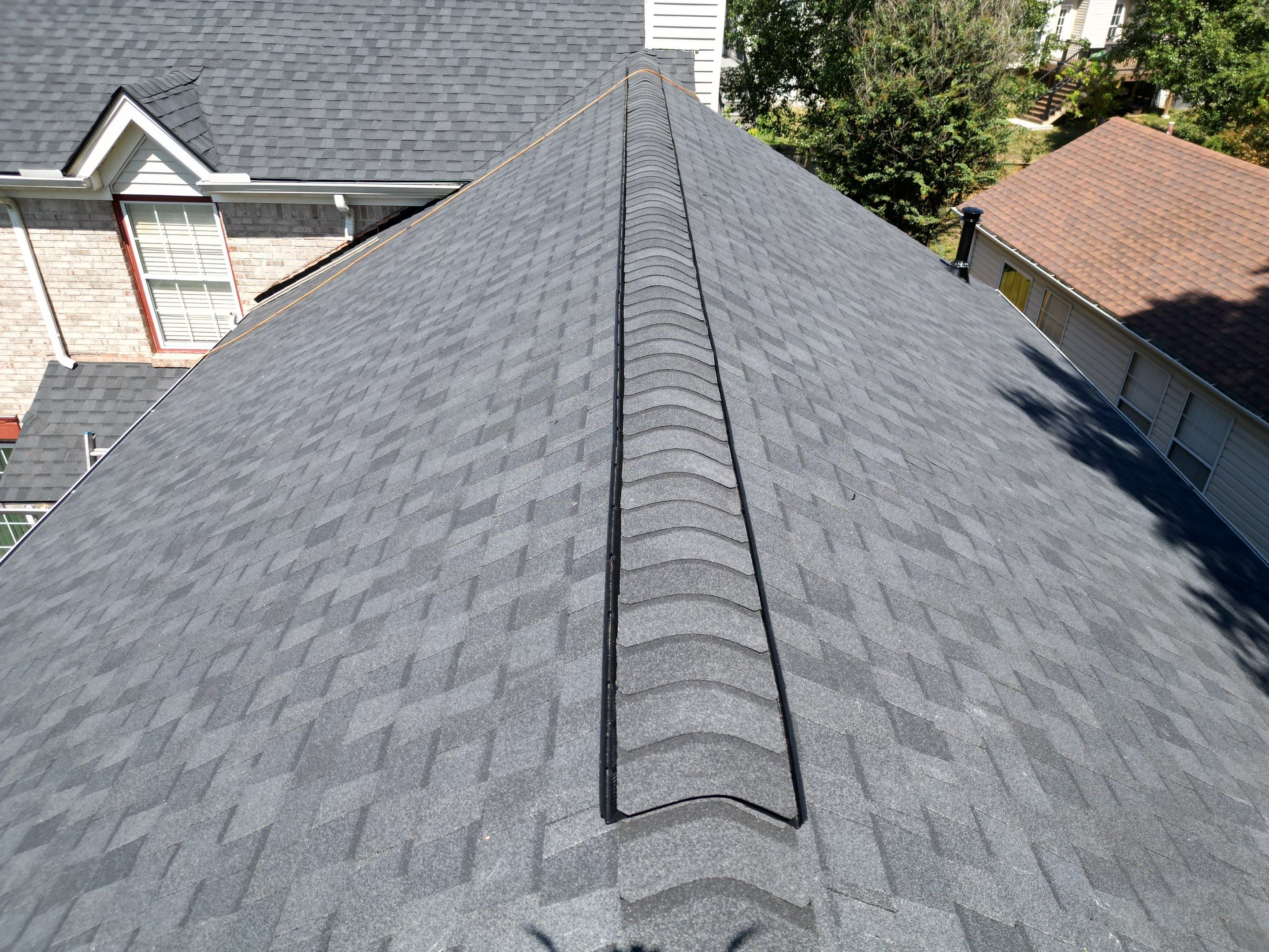 Moire Black Re-Roof by Royal House LLC