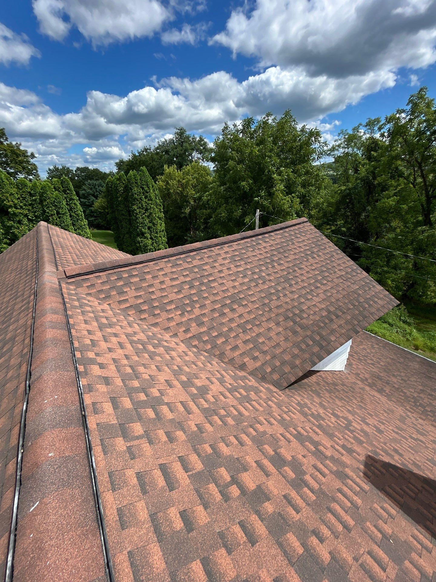 Edward Seal Full Metal Roof Installation by Good Hands Roofing