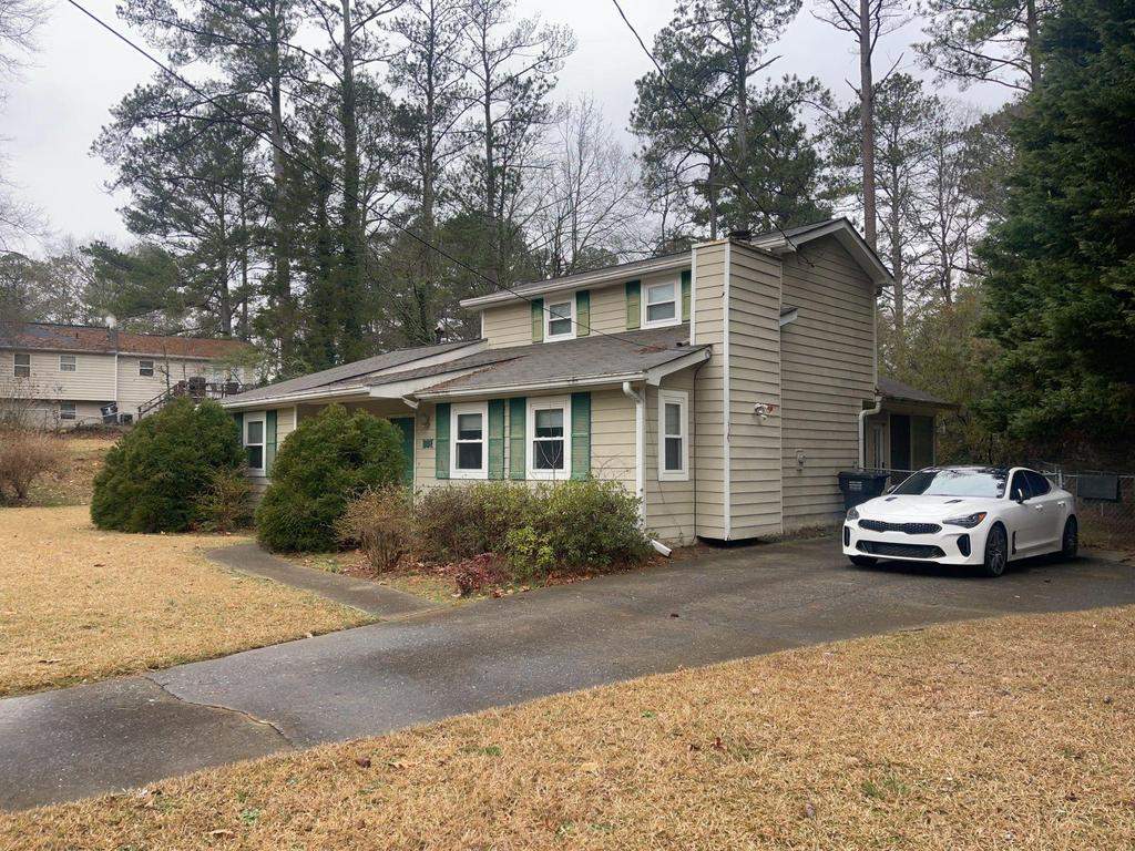 Marietta, GA Siding, Rotten Wood, Front Door, and Gutter Replacement with Exterior Painting by Nelson Exteriors