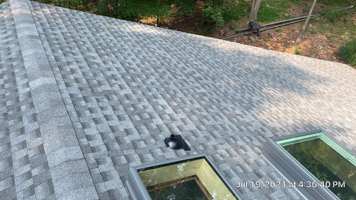 Deckhouse Roof Replacement by American Home Contractors