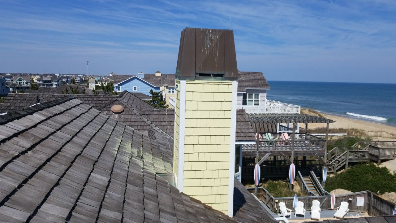 Chimney Chase using Copper by Gallop Roofing & Remodeling, Inc.