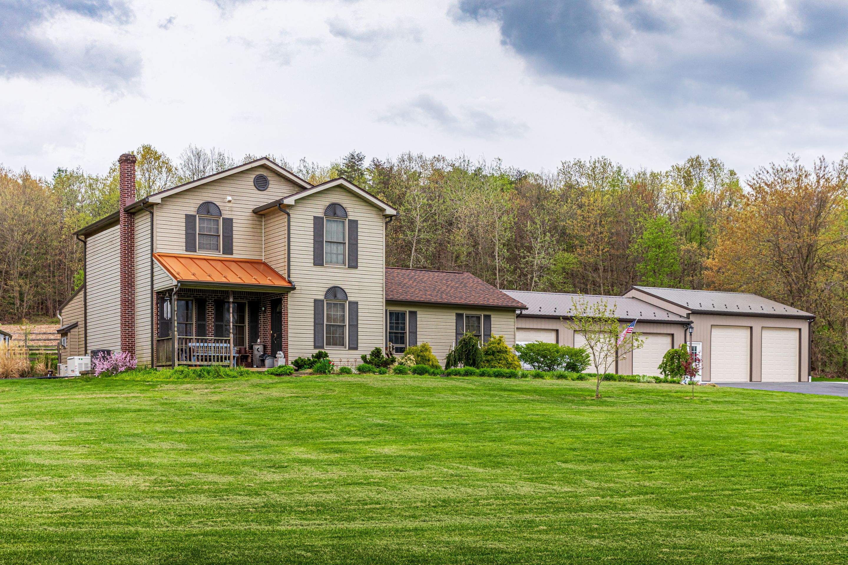 Shingle Roof-hickory, Metal Roof-bronze, Garage addition by Esh Builders