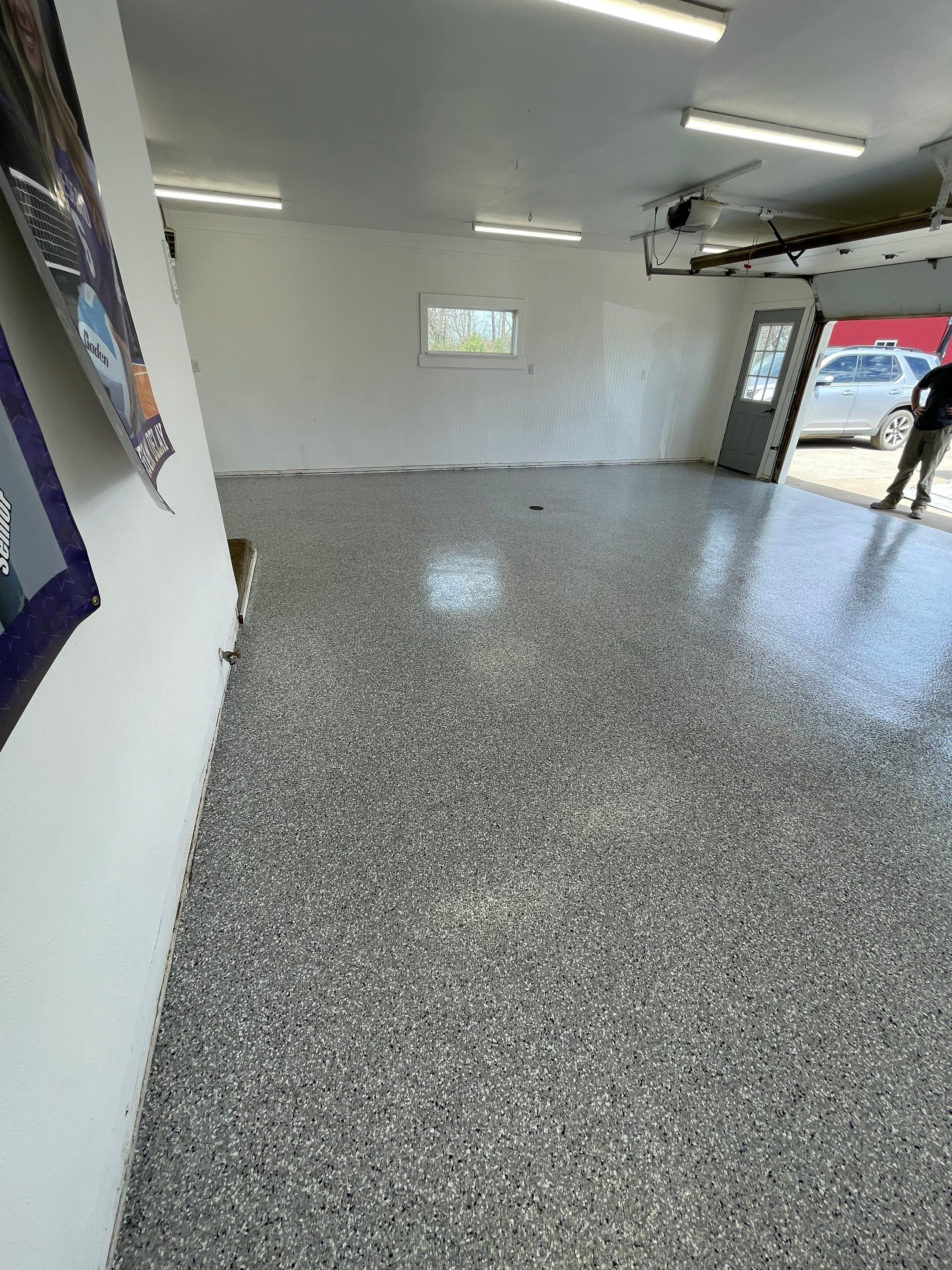 Feather Grey Garage Floor Coating and Crack Repair in Beresford by Select Painting, Coatings & Garage Cabinets