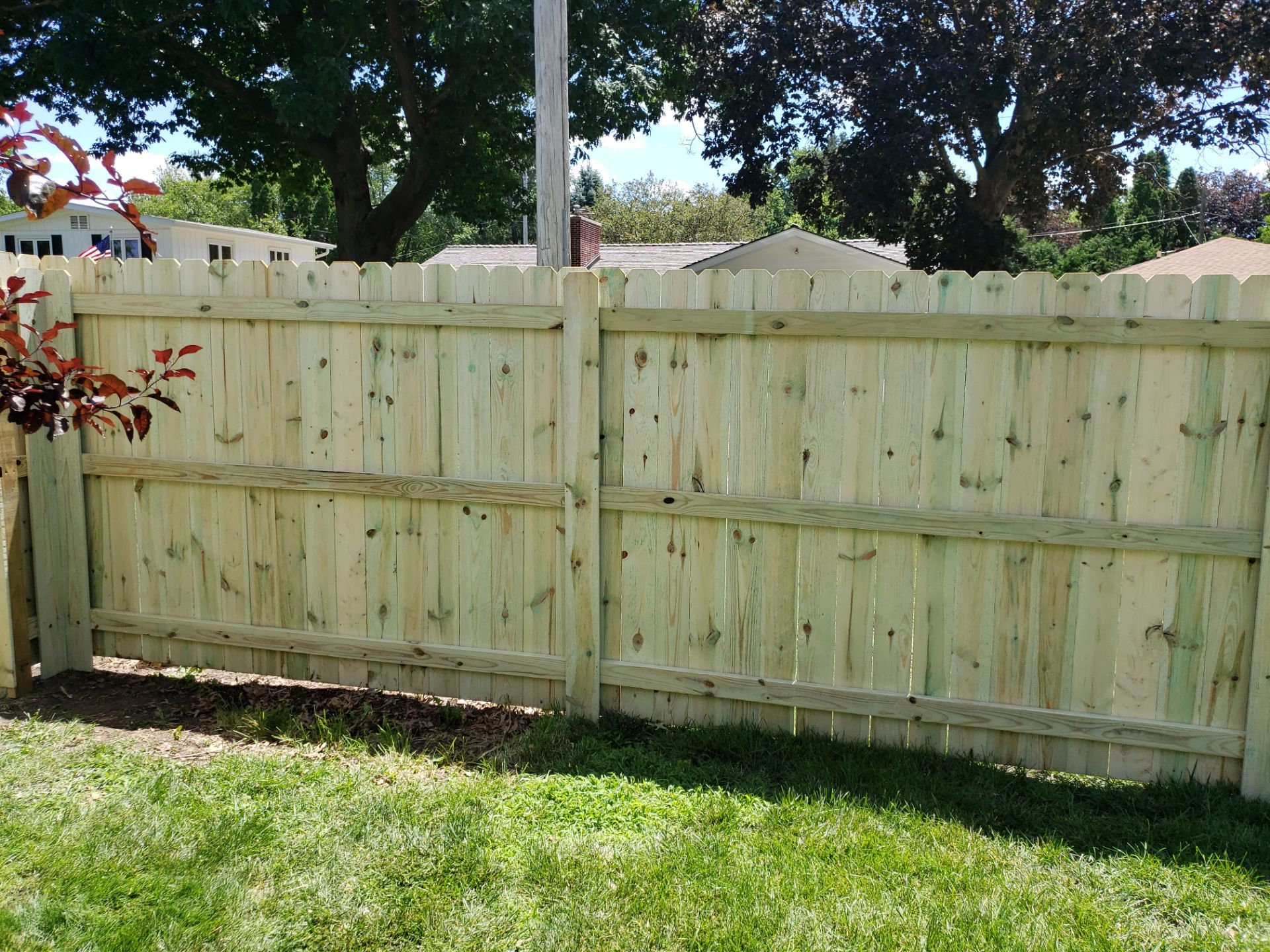 Pressure-Treated Pine Privacy Fence Replacement in Waterloo, Iowa by Perfect Picket Fence and Stain
