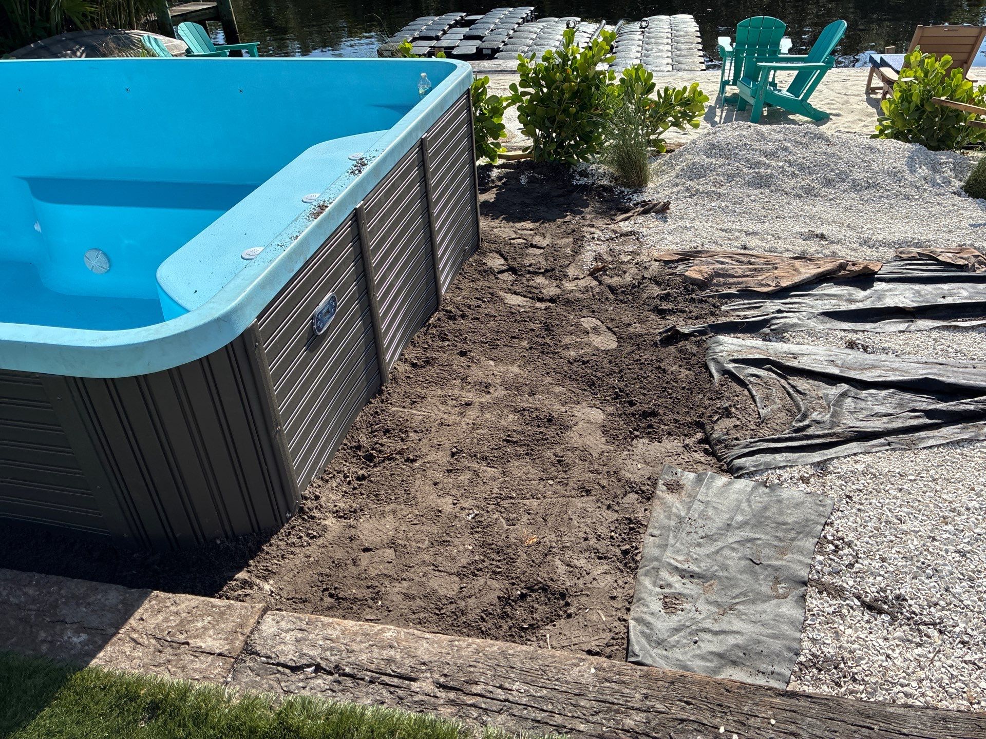 Grading back yard oasis by Level One Grading