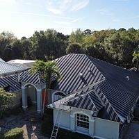 24ga 1.5" Mechanical Seam Matte Black by Total Roofing System The Metal Roof Experts