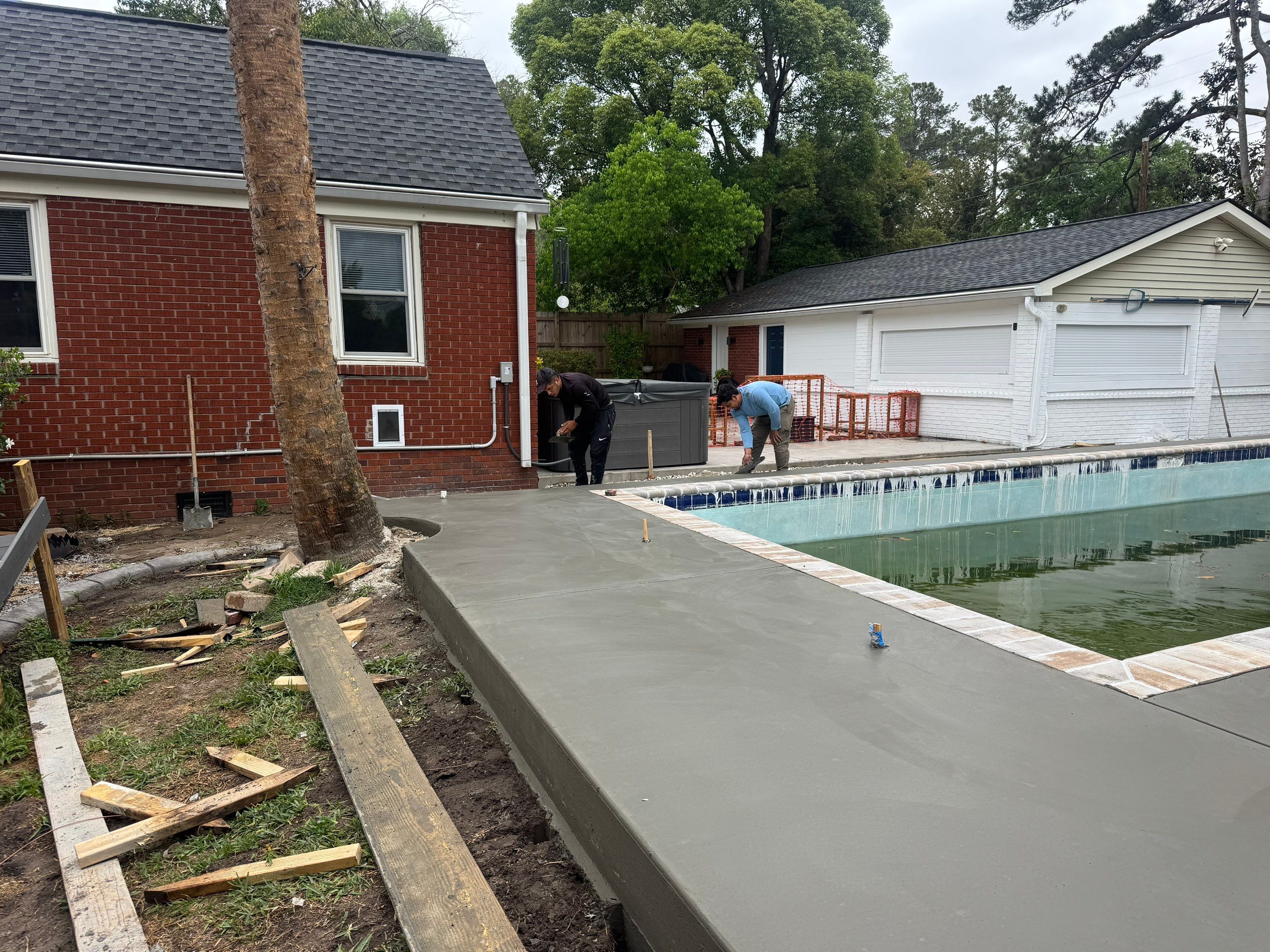 Savannah Pool Deck Replacement with Textured Concrete and Brick Coping by Lowcountry Scapes, LLC