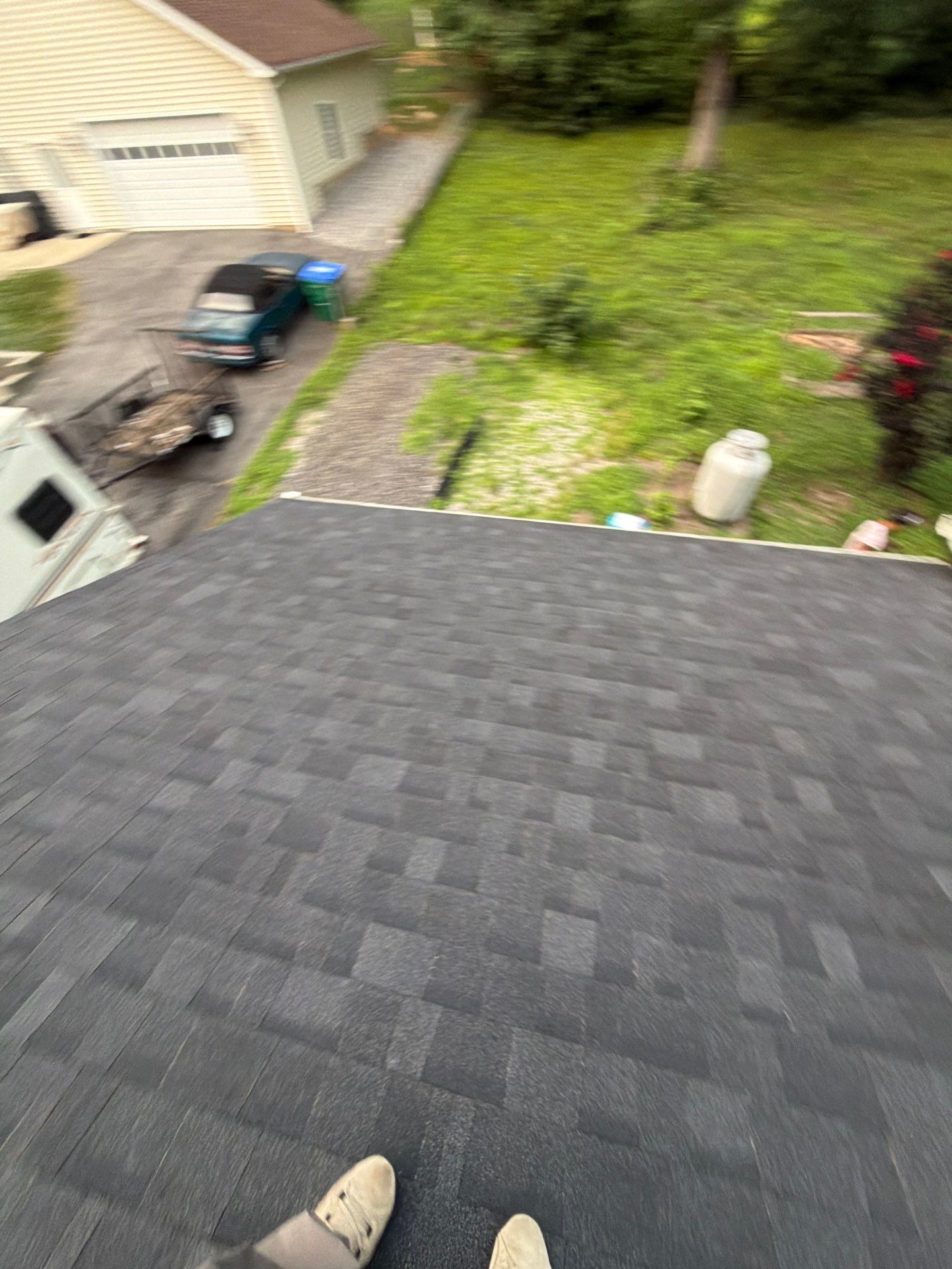 Asphalt Shingle Roof Replacement and Gutter Installation in Richmond by Cade Construction