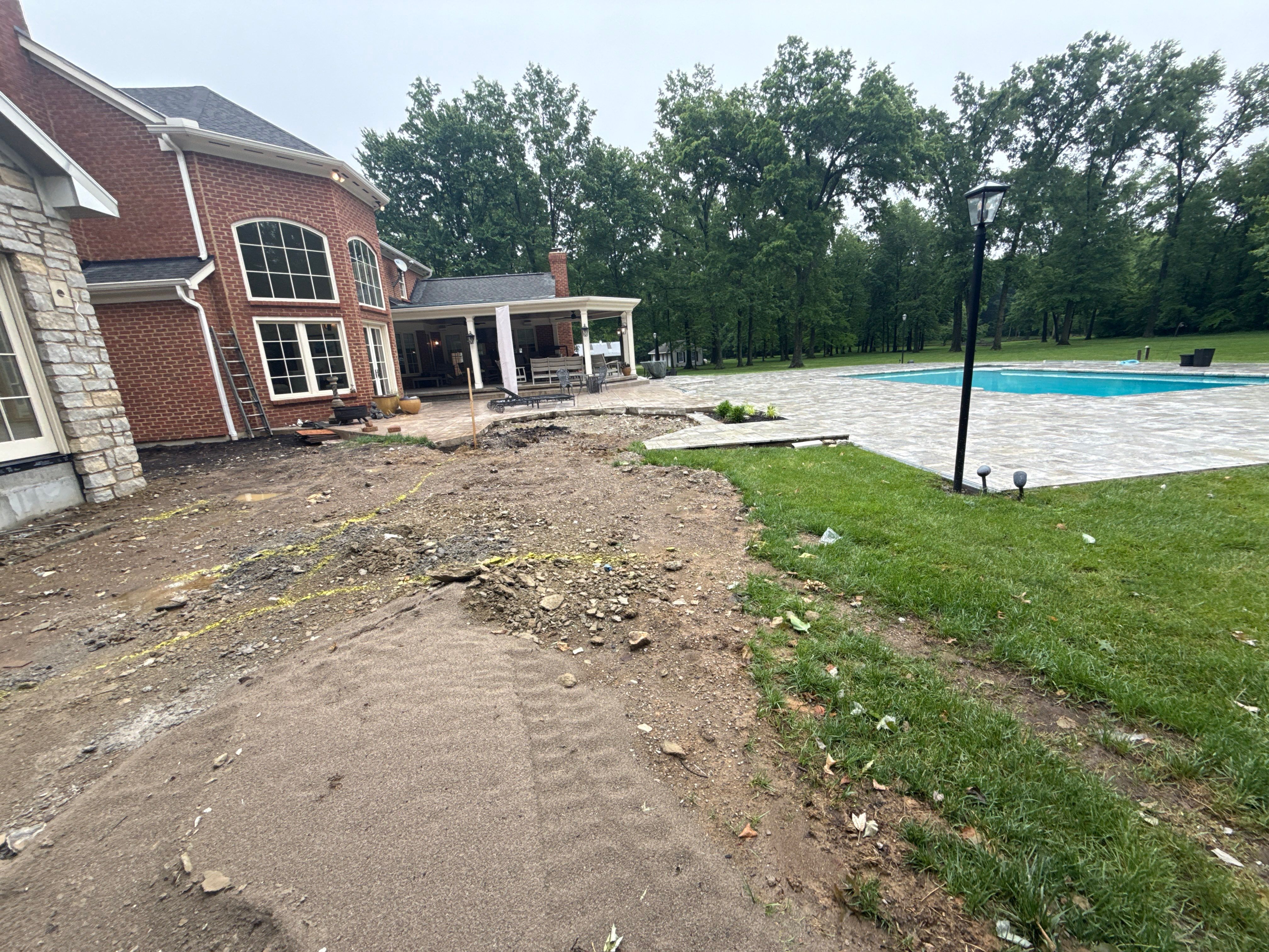 Custom Backyard Golf Green Accented by Flagstone Border in Morrow, OH by Southwest Greens Midwest
