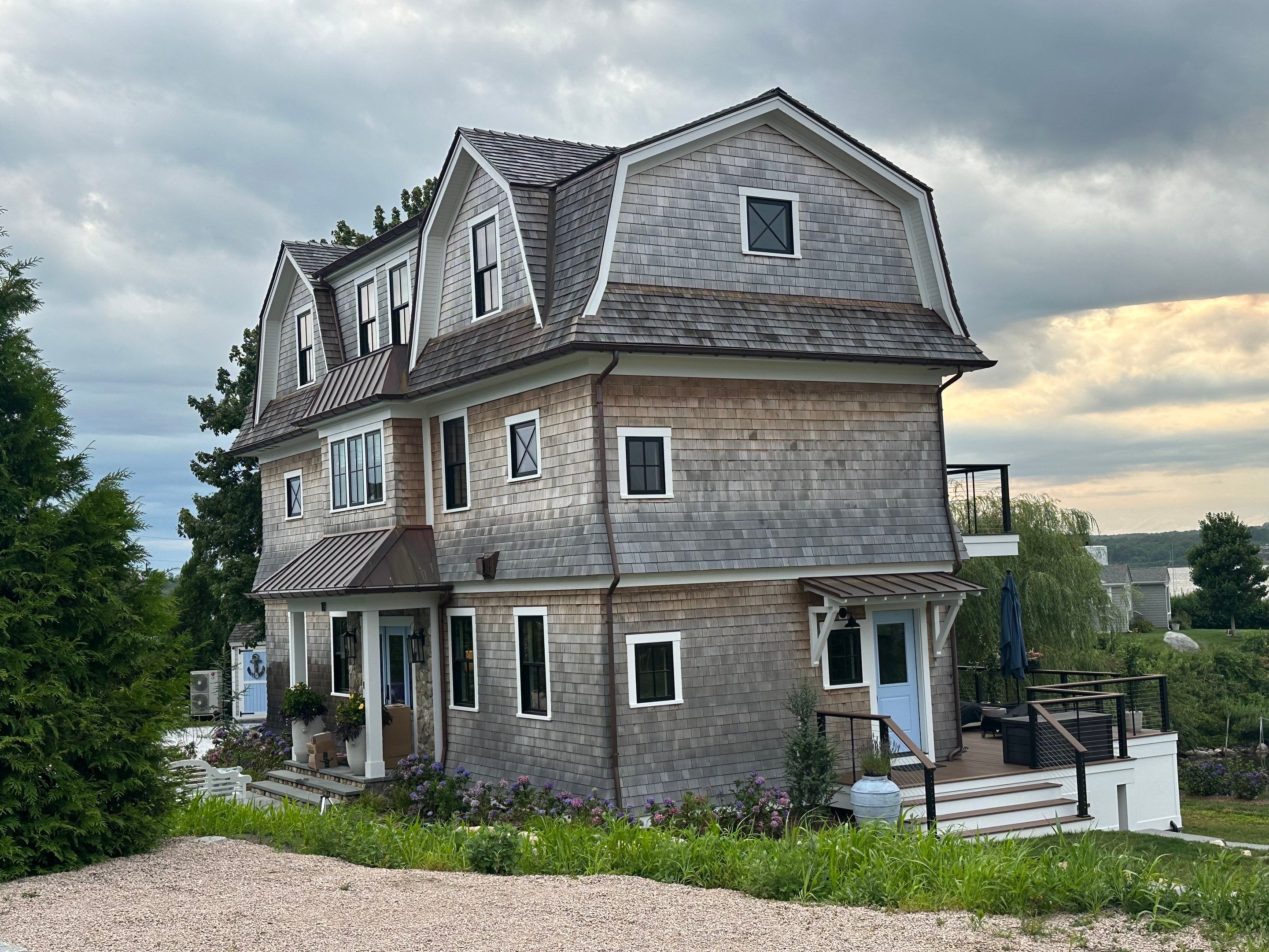 Great Island - Red Cedar Roofing, Yellow Cedar Siding, Standing Seam Copper, & Copper Gutters by Rinaldi Brothers