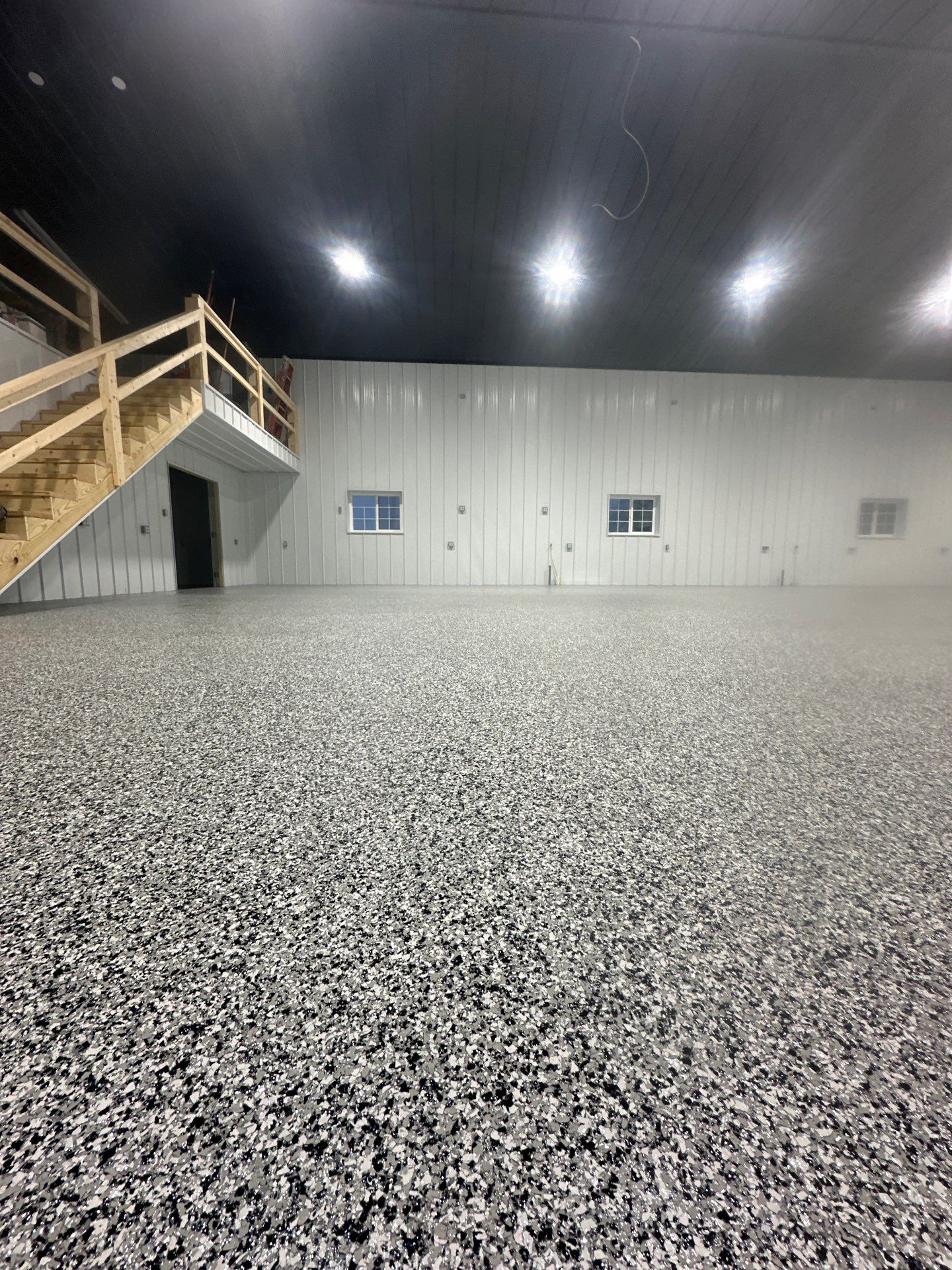 Barndominium Flake Coating using Polyaspartic by Revival Concrete Coatings