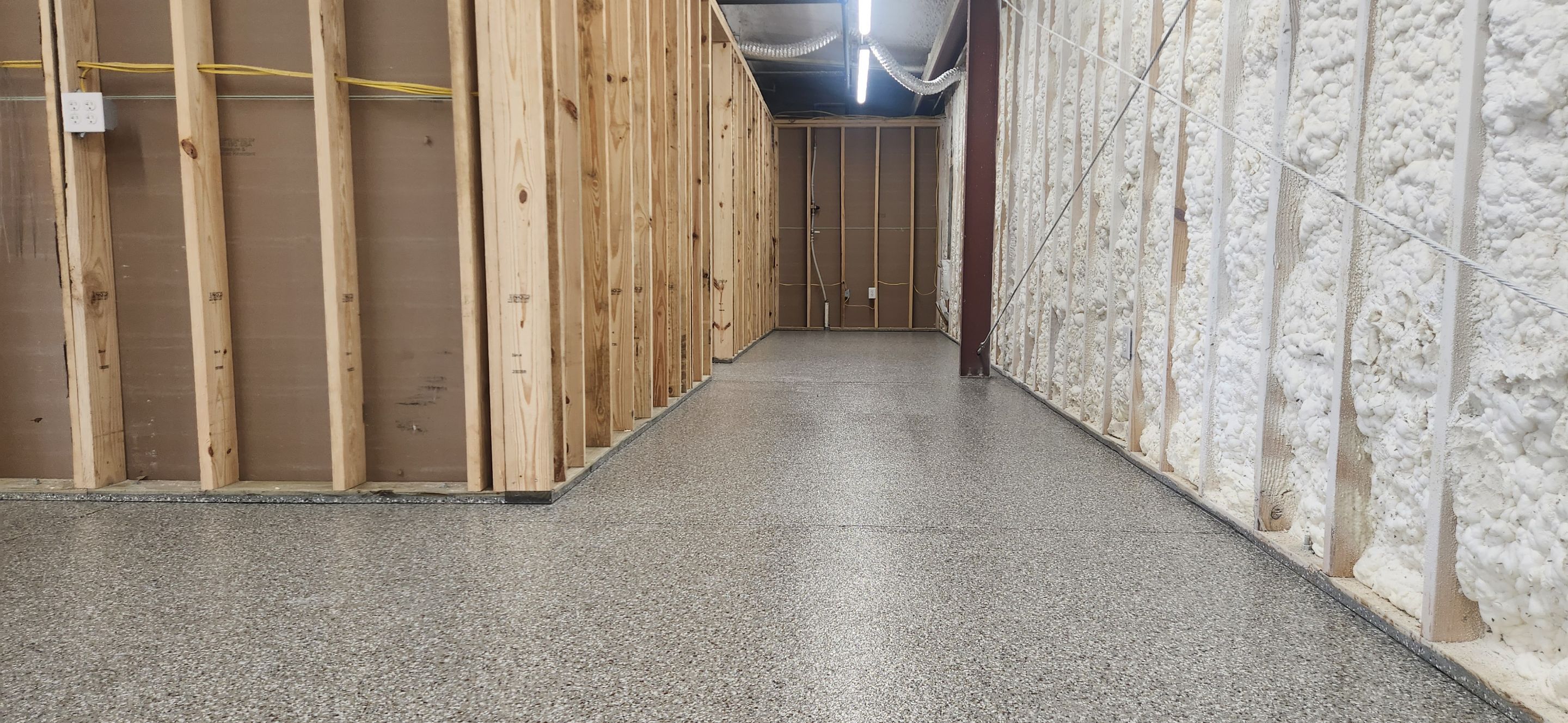 Church Storage Room & Bathroom Using Creekbed by Elite Floor Solutions