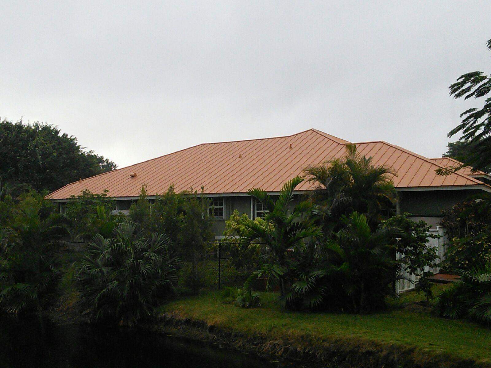 Residential Roofing Installation using 1" Nail strip metal roof by BLUES BROTHERS CONSTRUCTION CORP