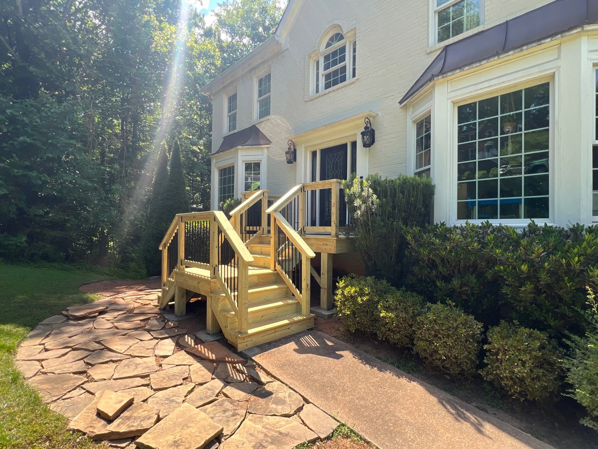 Custom Natural Wood Entryway Deck Replacement in Acworth, Georgia by Swift Home Renovations