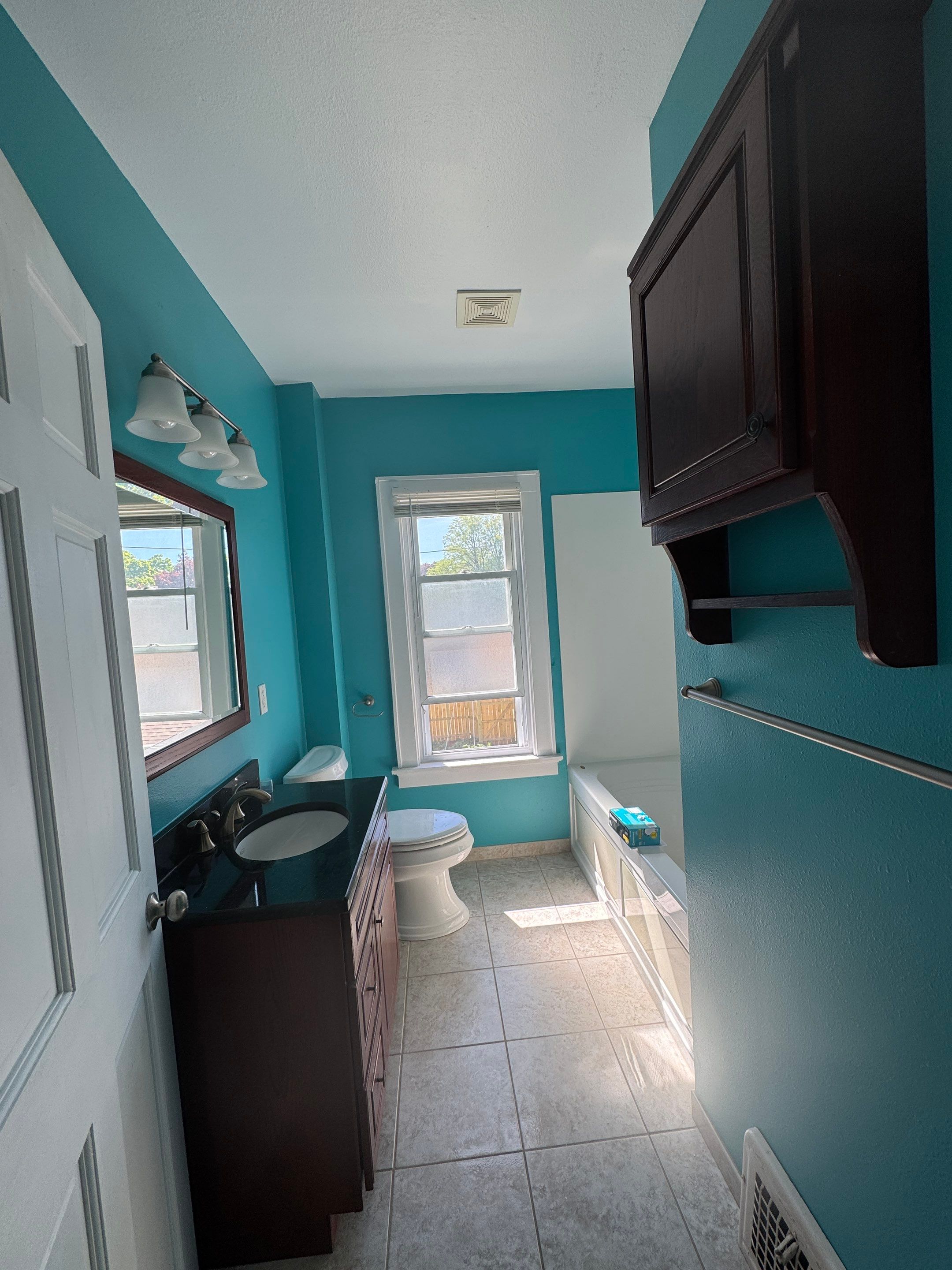 Milwaukee Bathroom Refresh With Acrylic Shower And Updated Fixtures by OCS Contracting Services