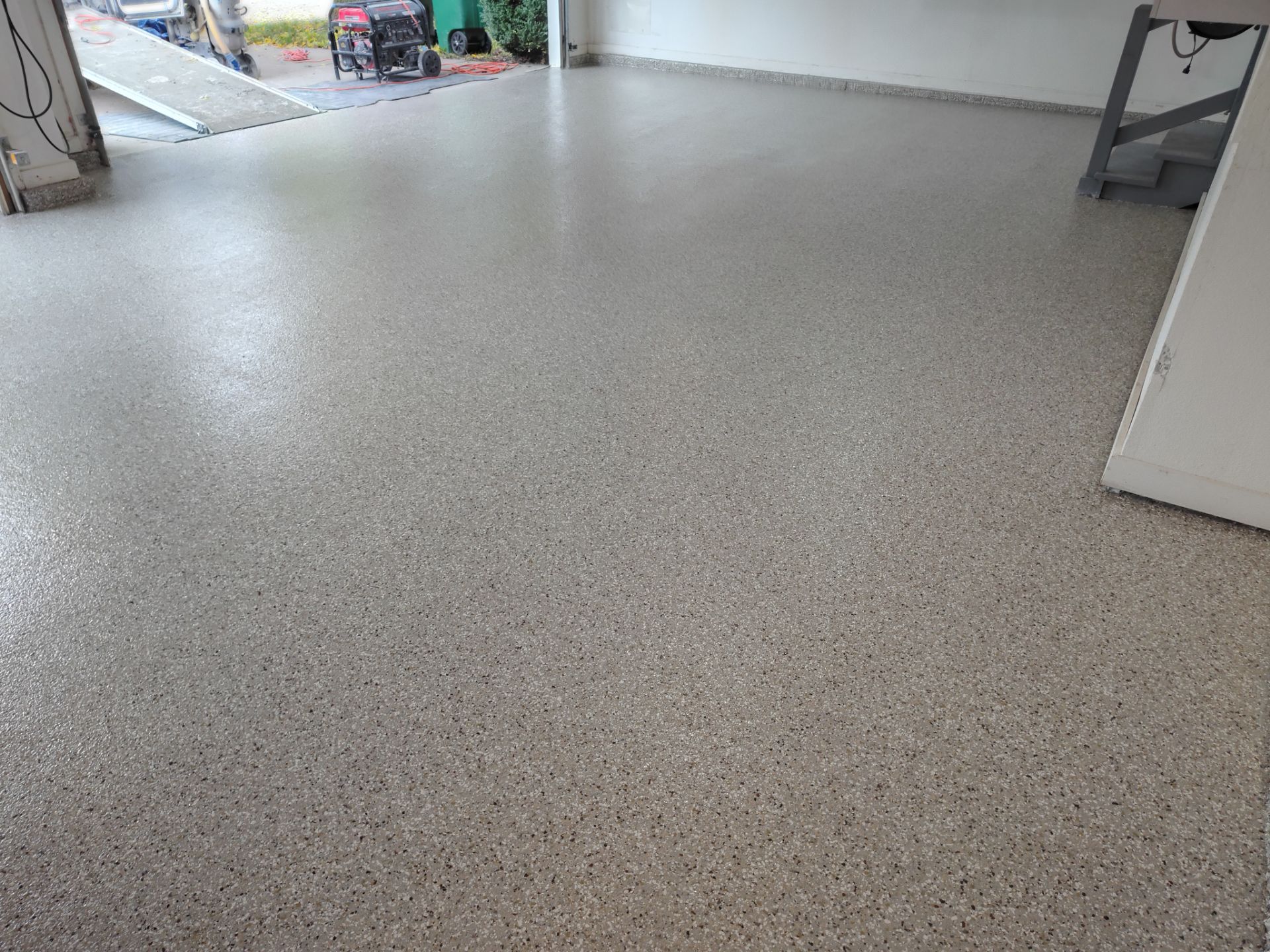 Residential Garage Floor Coating and Concrete Repair in Johnston by Revival Concrete Coatings