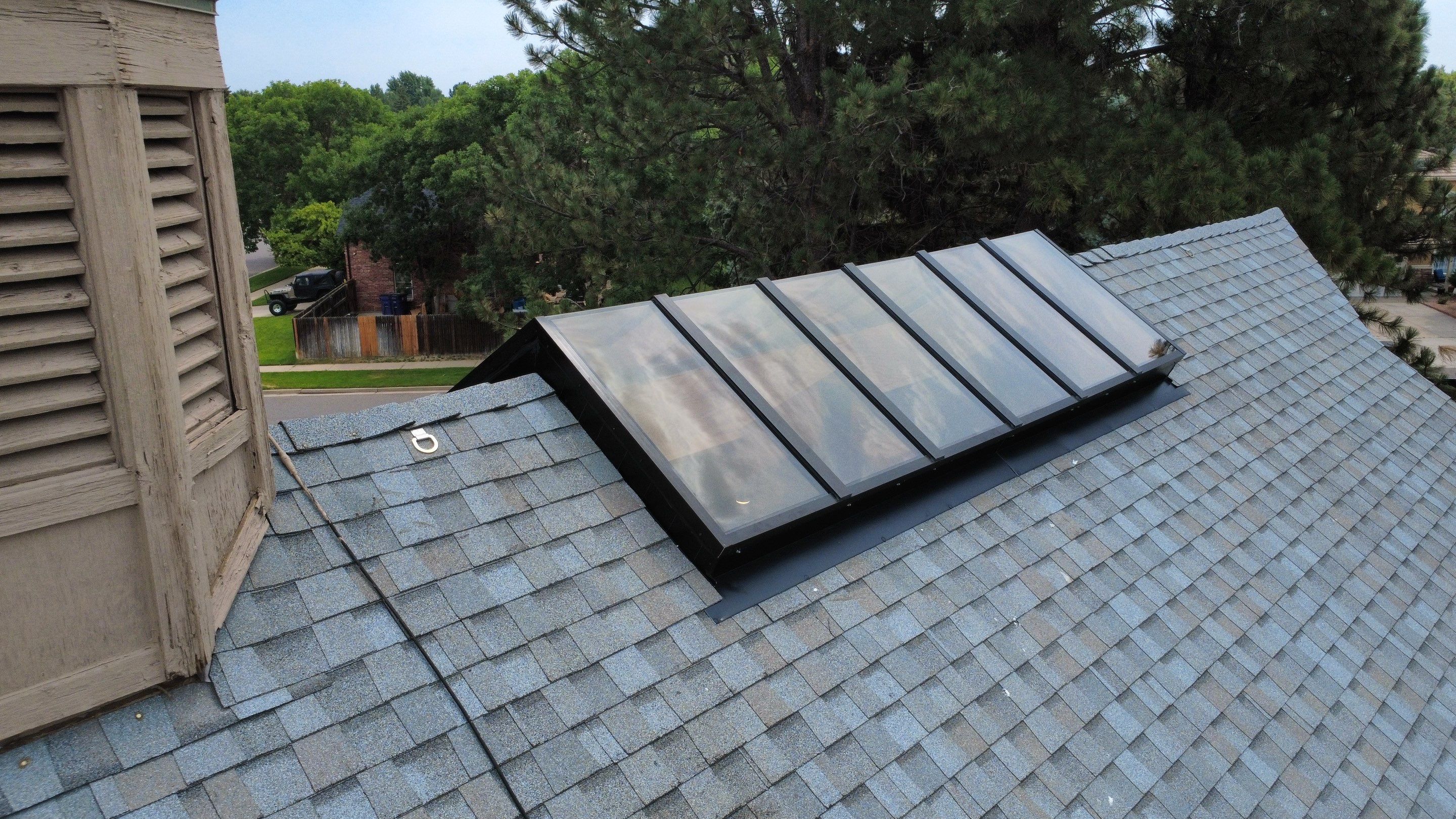 Asphalt Shingle and Skylight Replacement Project in Denver, CO by Blue Peaks Roofing LLC 