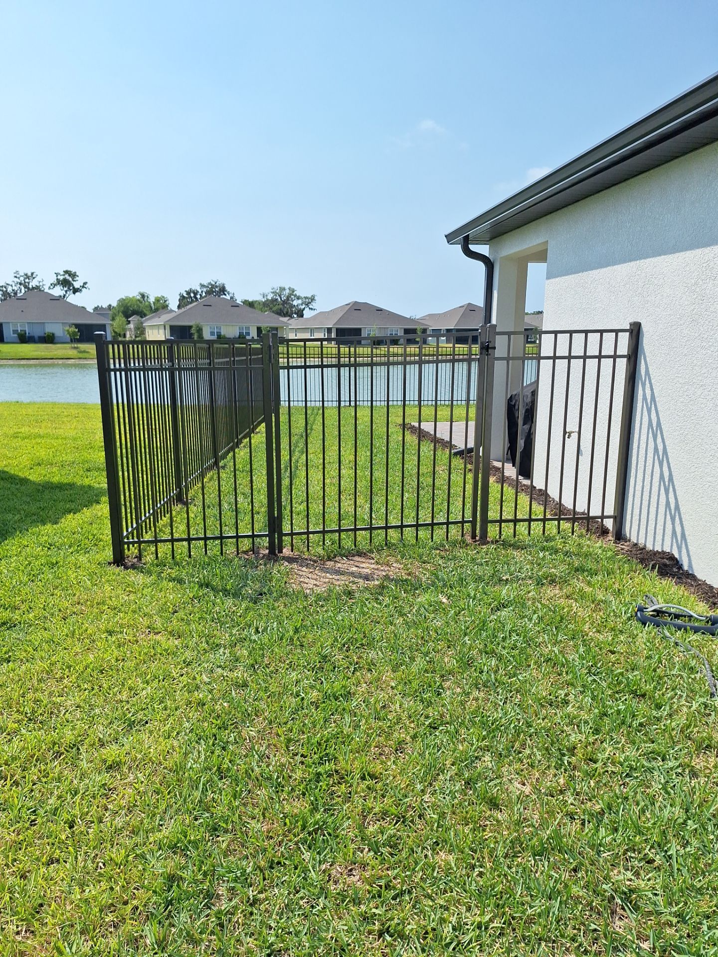 Aluminum Fence Installation using Black 3 Rail Aluminum Fence by Asap fence and gates, LLC