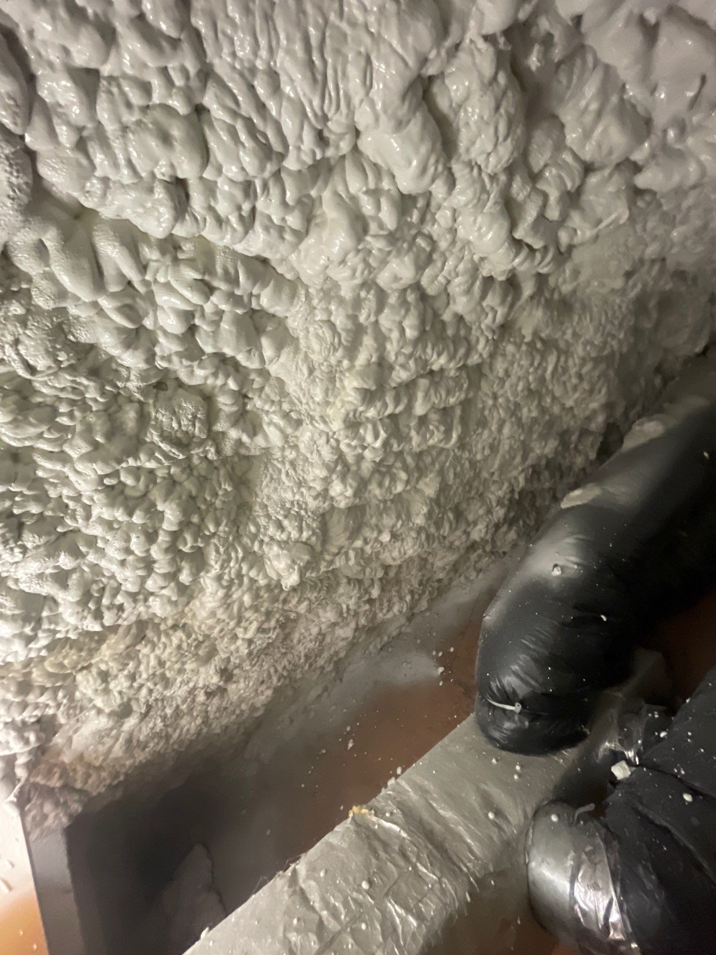 Attic Insulation using open cell spray foam by NYS Foam & Energy