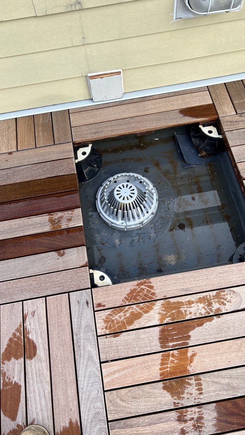 Seattle Queen Anne Rooftop Deck and Roof Replacement using Standing Seam Metal - Black by RoofSmart