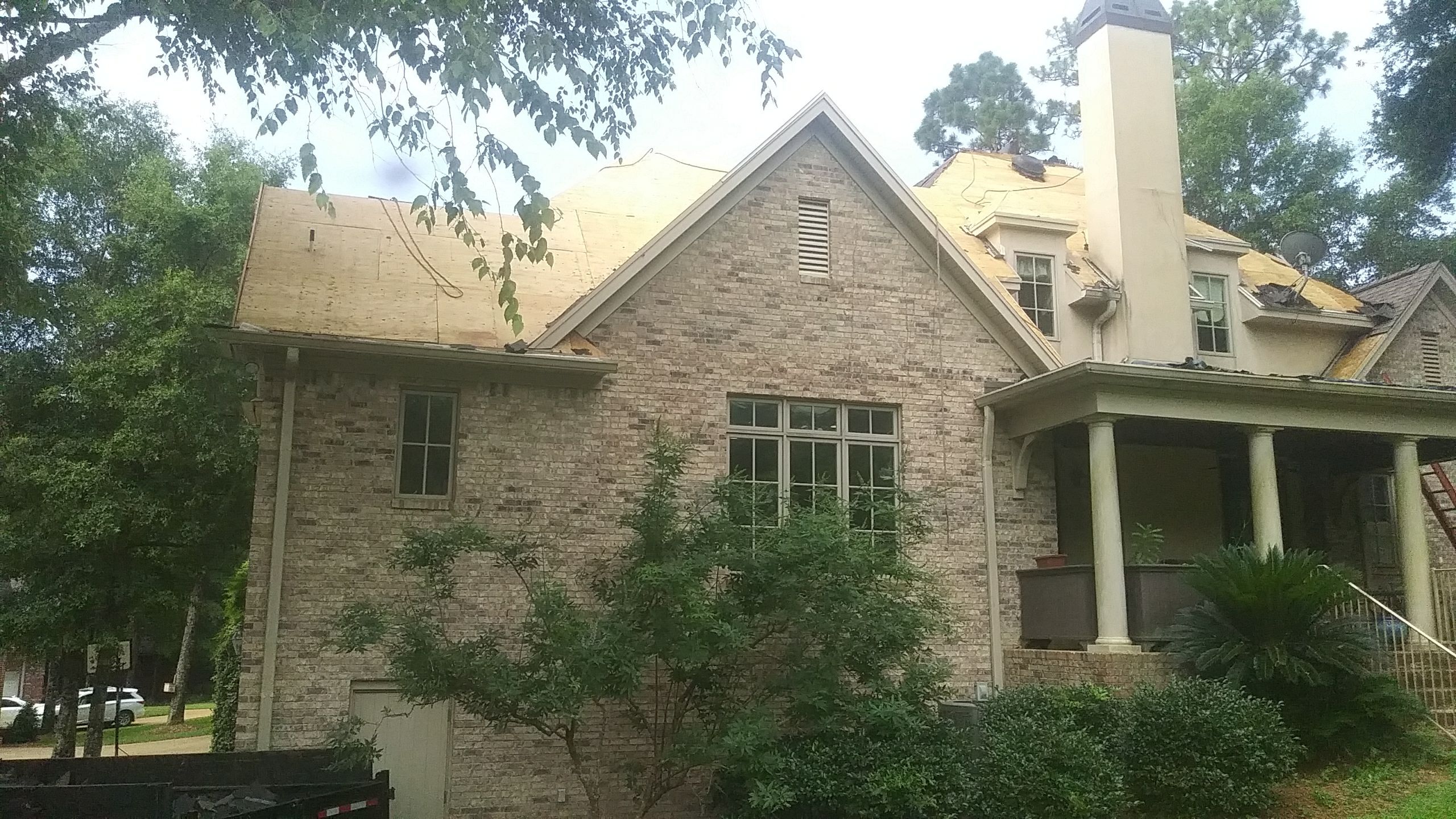 Residential Roofing Repair using Roof Replacement by American Roofing & Construction LLC