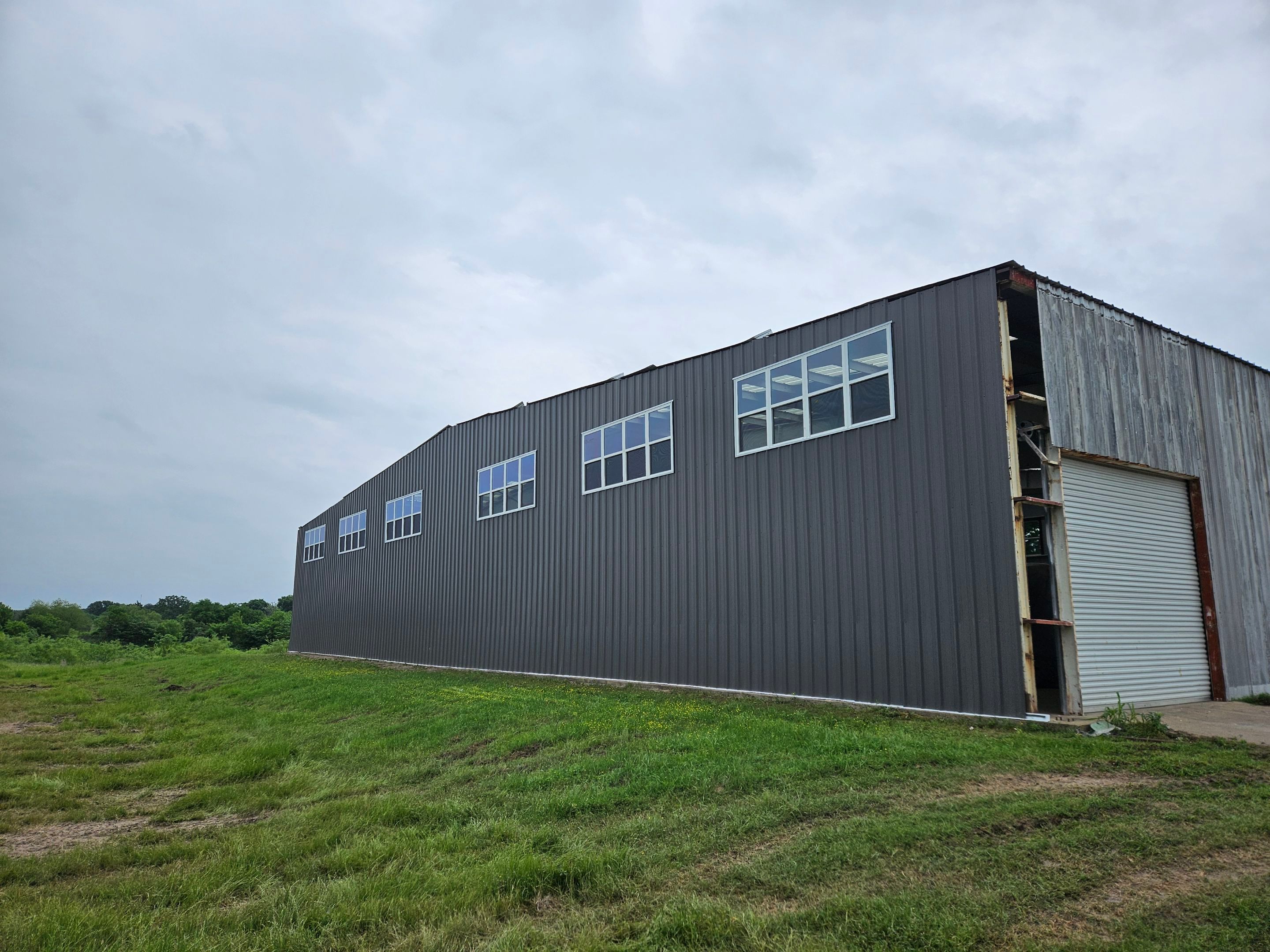 Complete Restoration with Skylight/Window Install - Greenville, TX by Hostetler Roofing