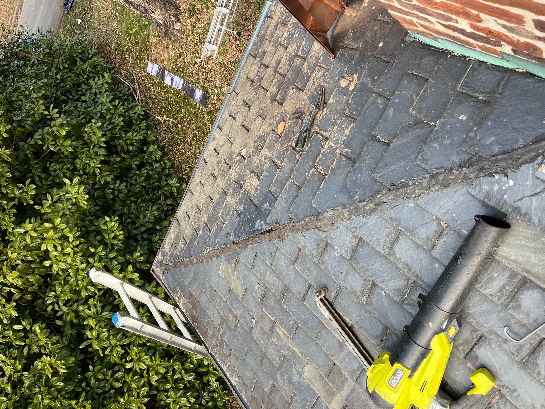 Slate Roof Restoration and Copper Ridge Cap Install in Richmond by Cade Construction