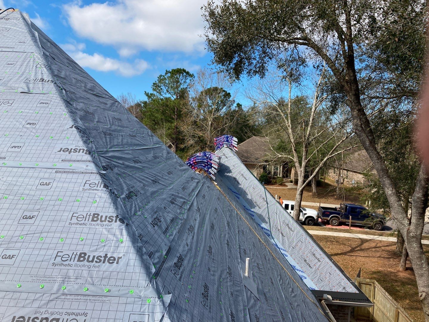 Residential Roofing Installation using Roof Replacement by American Roofing & Construction LLC