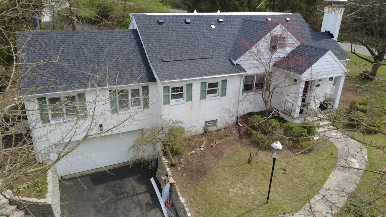 A gorgeous new roof to start on rebuilding the life in this home.  by Level Up Roofing and Restoration Services LLC