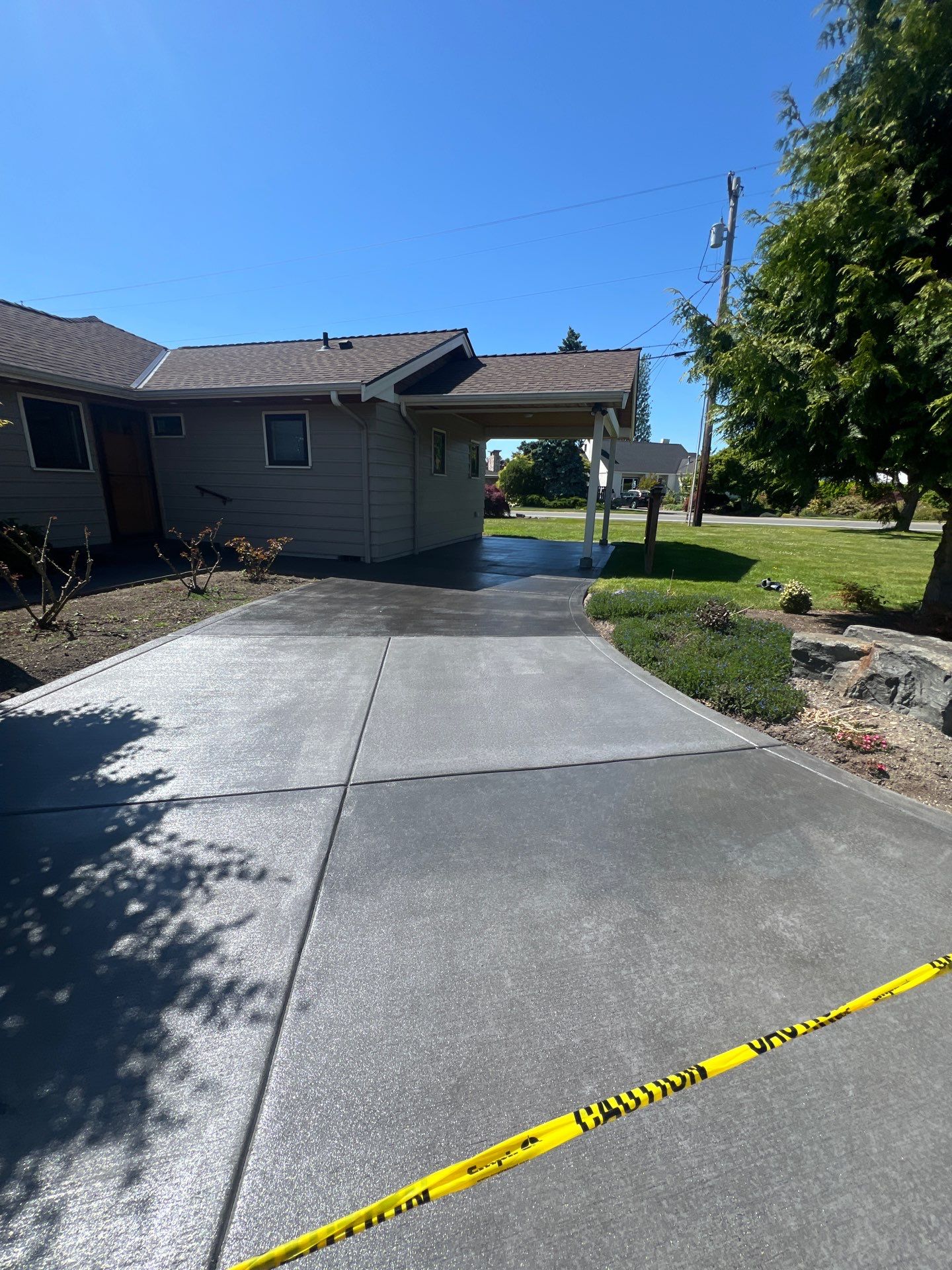Colored Concrete Driveway Repair with Sealer| Everett    by Jireh Asphalt & Concrete Inc 