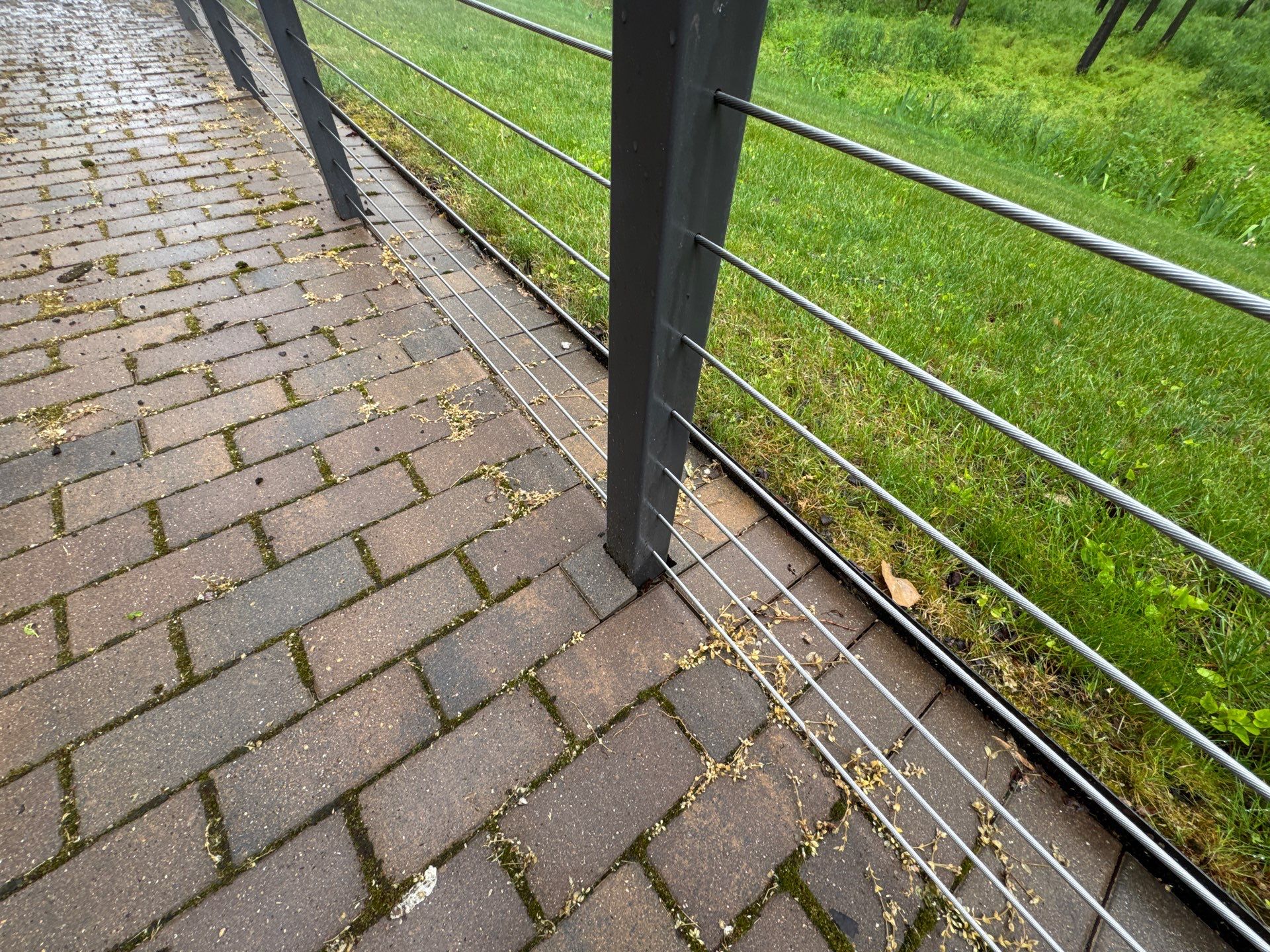 Brick paver repair, cleaning, sealing and poly sanding by Northern Power Washing LLC.
