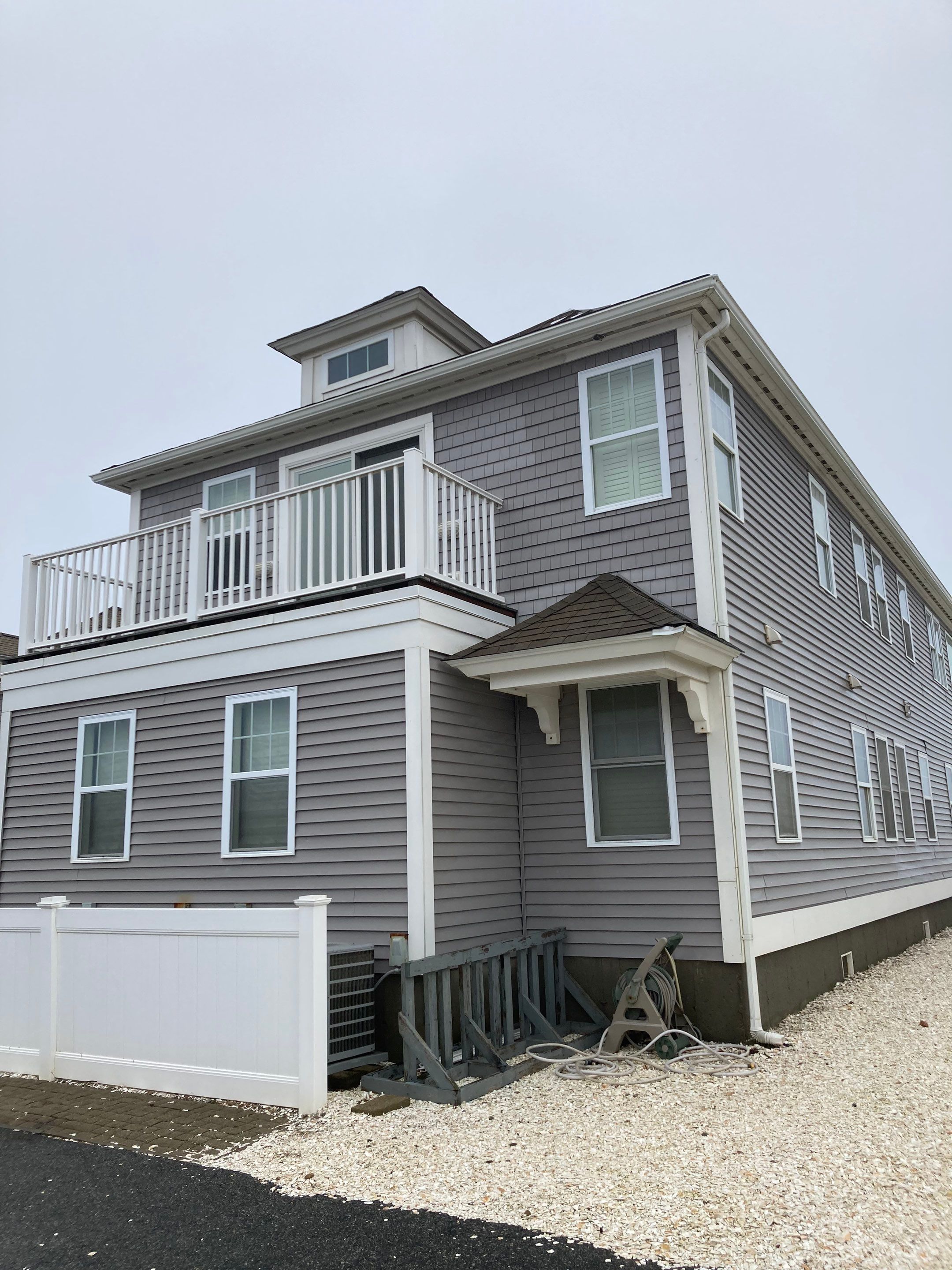 Gutter Installation using 6" K-Style Aluminum Gutter on the Seaside Inn in Truro, MA by Gutter Pro Enterprises