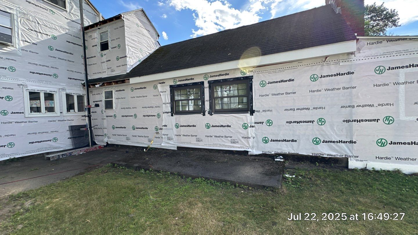 James Hardie Lap Siding Installation in Chelmsford, MA by Mighty Dog Roofing of Greater Middlesex County