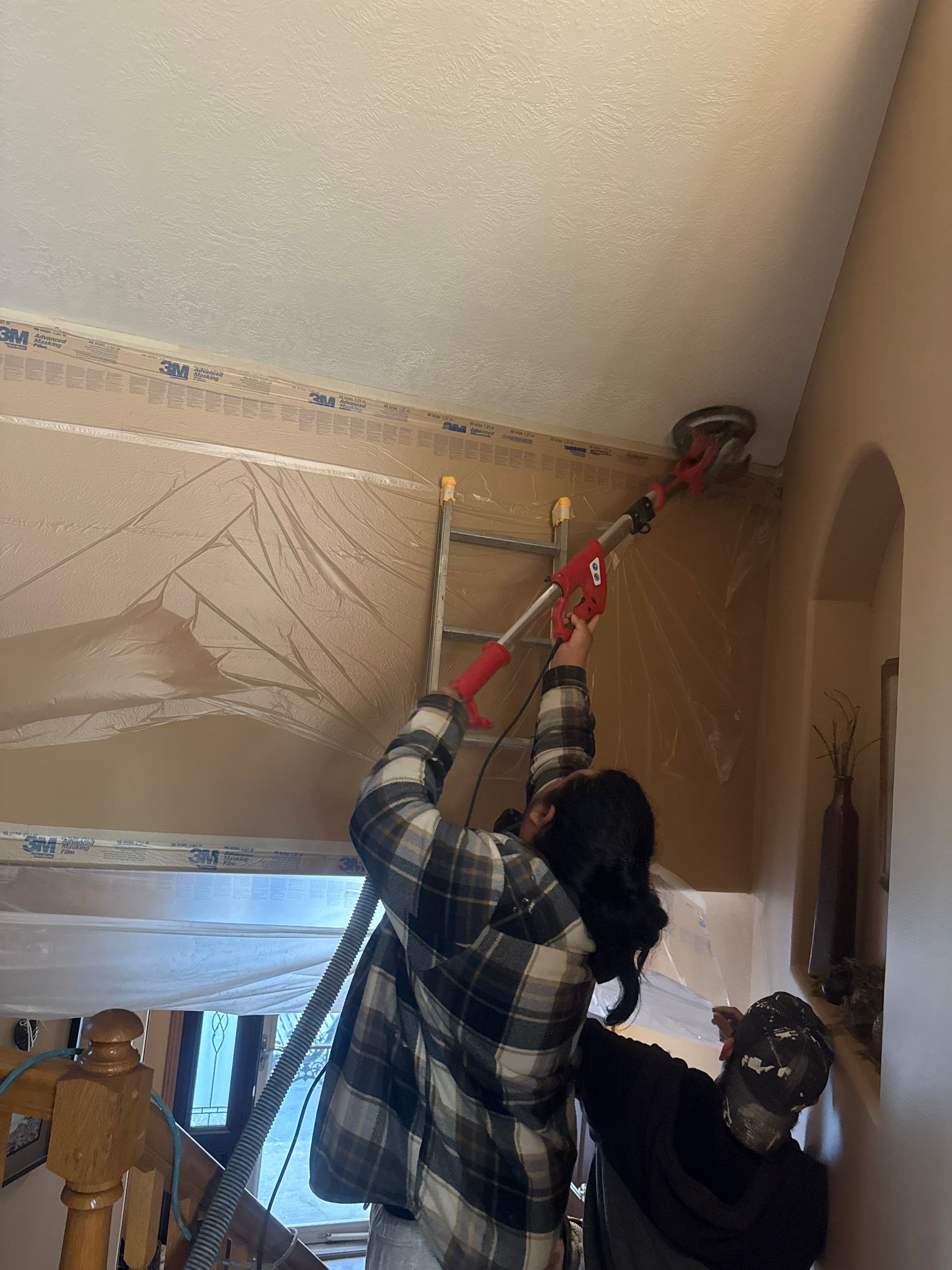 Interior Painting and Vaulted Ceiling Drywall Tape Repair in Sioux Falls by Select Painting, Coatings & Garage Cabinets