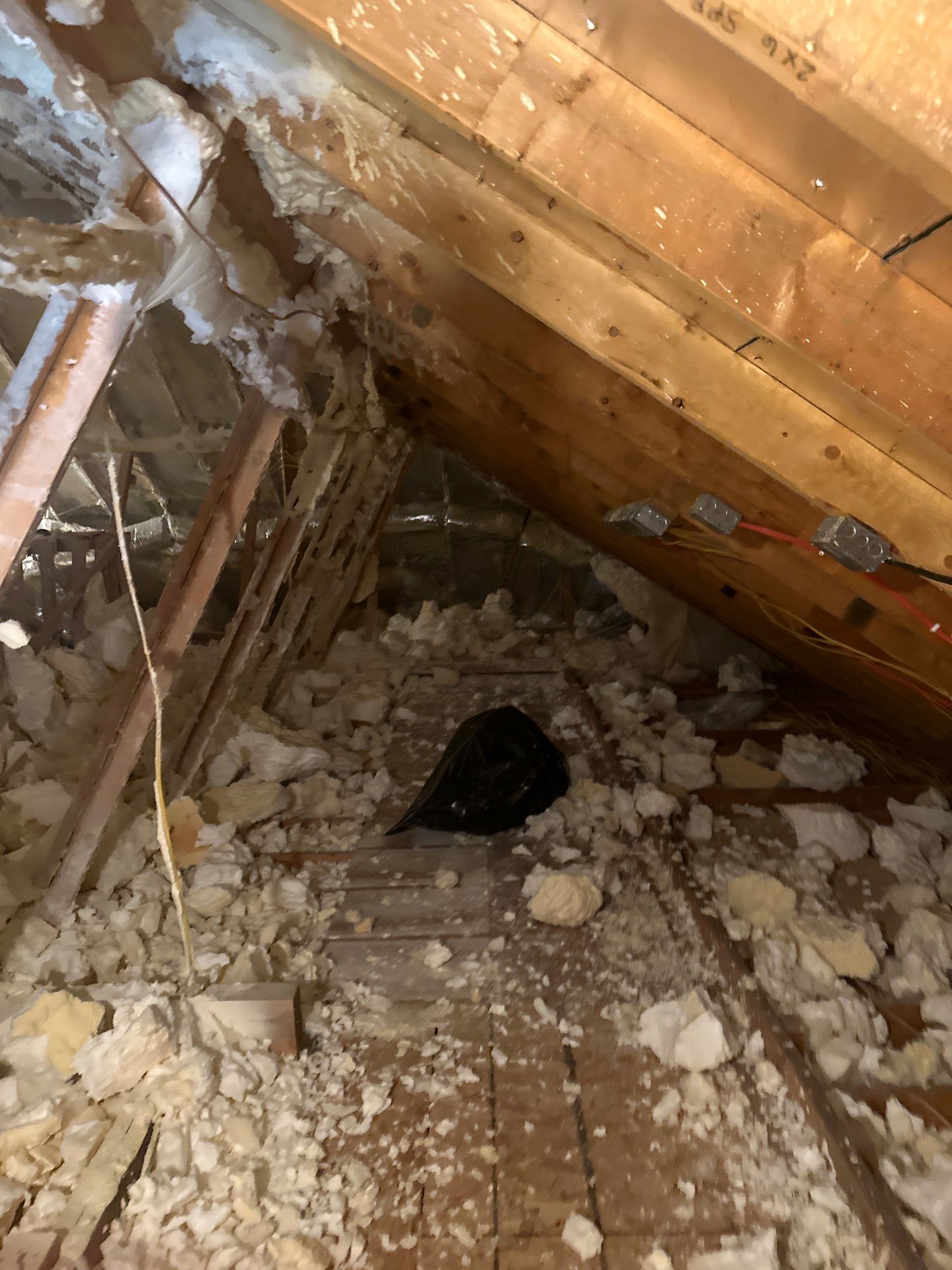 Spray foam insulation removal & re spray by Apex Insulation Solutions