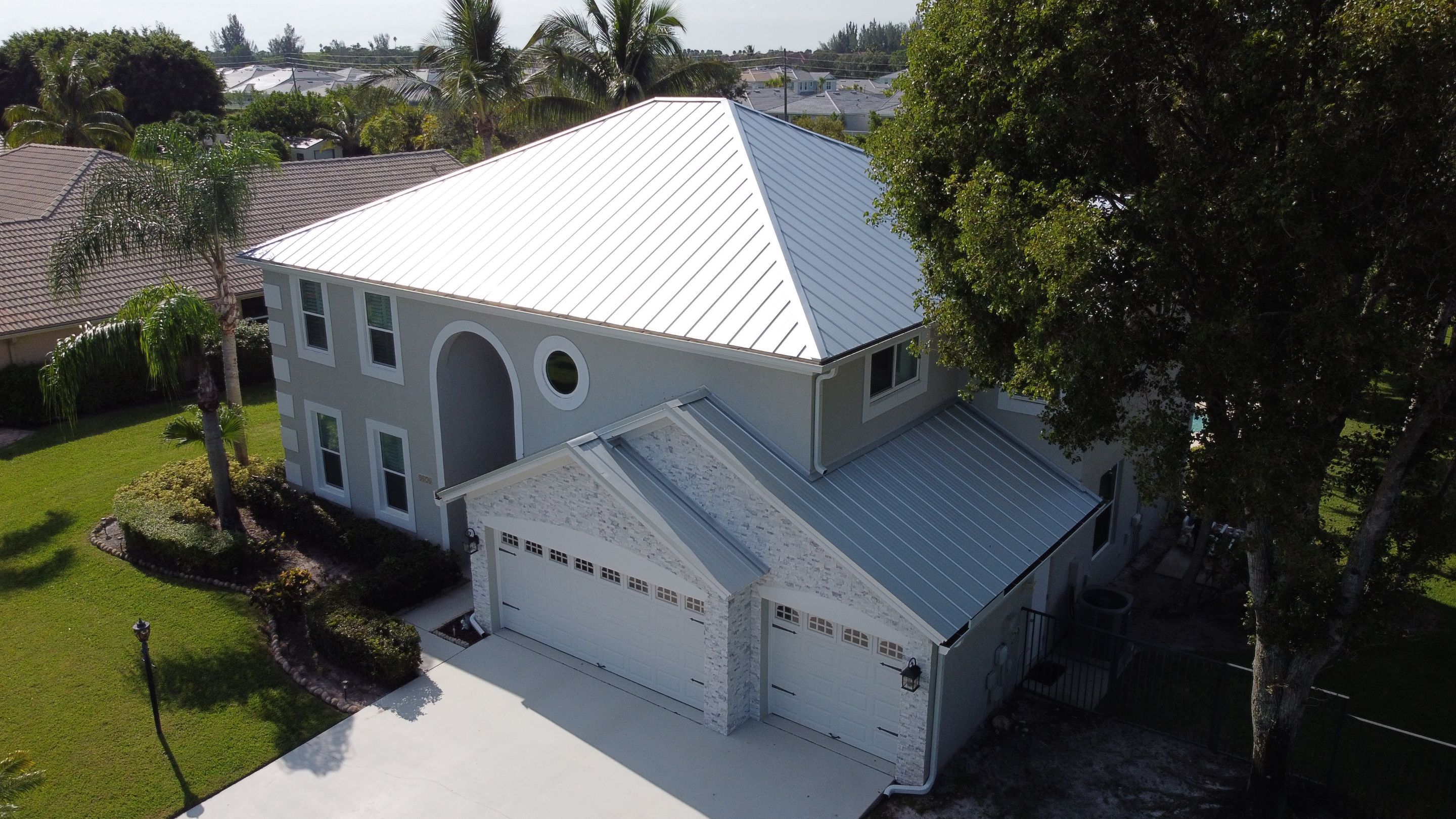 Residential Roofing Installation using 1" Nail strip metal roof by BLUES BROTHERS CONSTRUCTION CORP