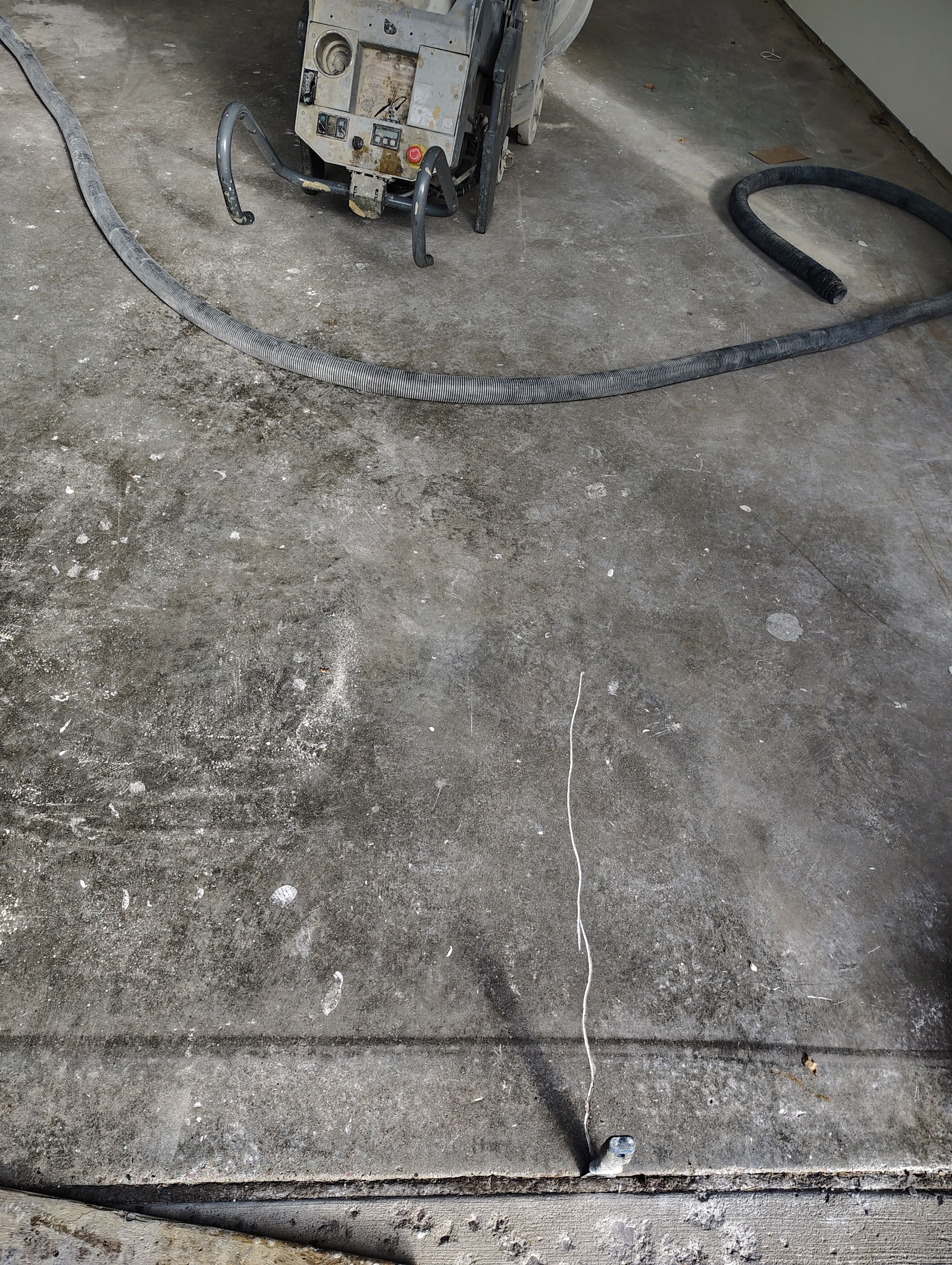Sioux Falls Garage Floor Coating with Speckled Flake Finish by Select Painting, Coatings & Garage Cabinets