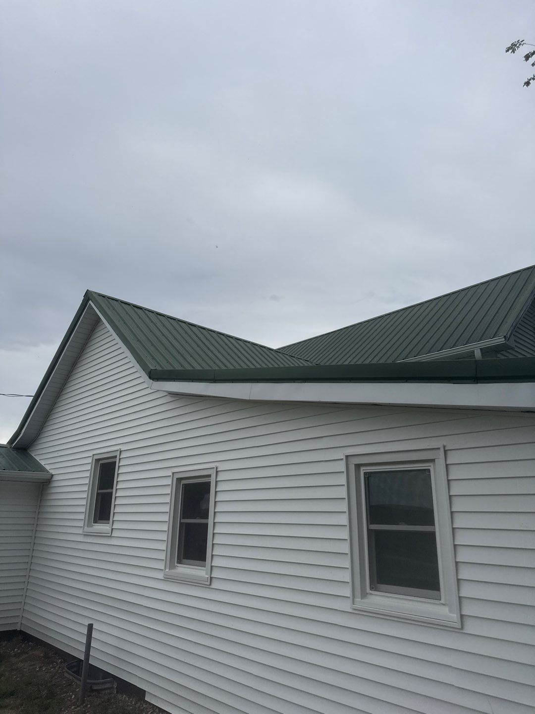 Standing-Seam Metal Roof and Vinyl Siding in Pender, NE by Crows Roofing LLC