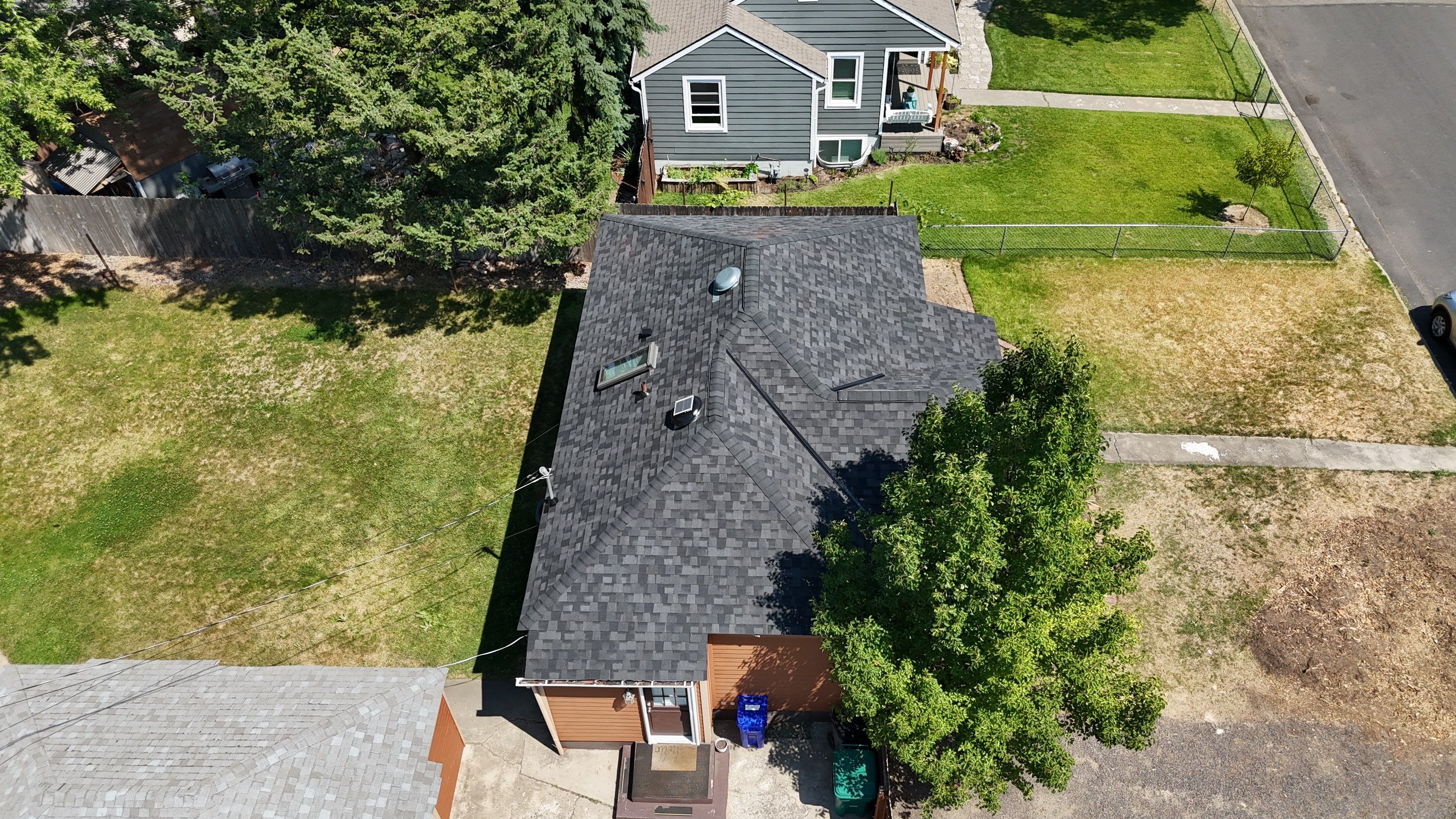 Alpine Roofing Completes Stunning CertainTeed Mac Def Moire Black Landmark PRO Installation on N Andrew St, Spokane, WA by Alpine Roofing