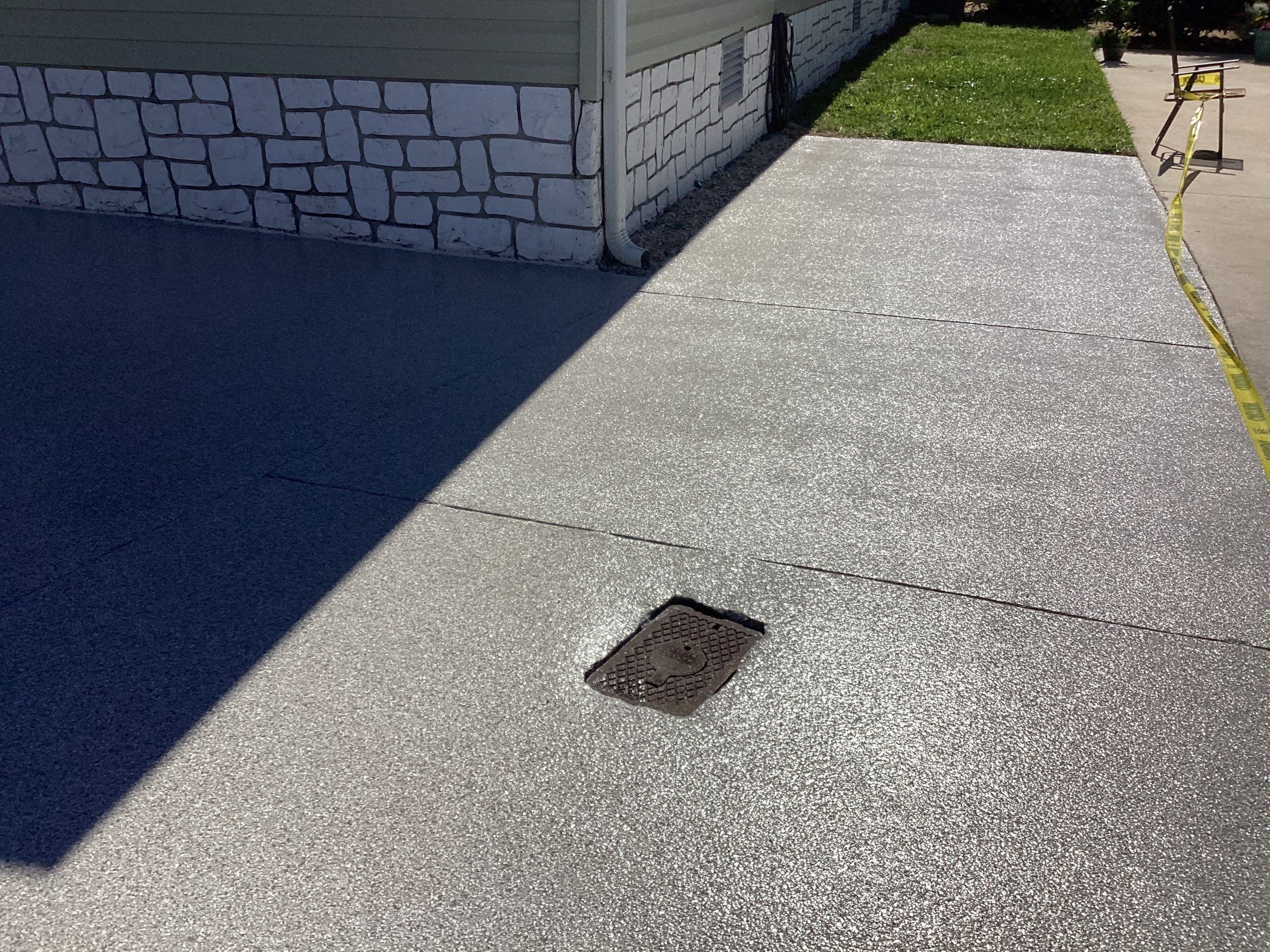 Driveway using Mt Everest by Amvet concrete coatings llc