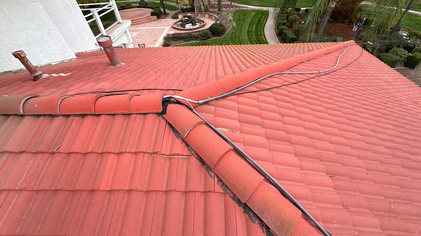 Tile refurbish project using existing tiles and replaced underlayment and battens by Straight Edge Roofing Inc