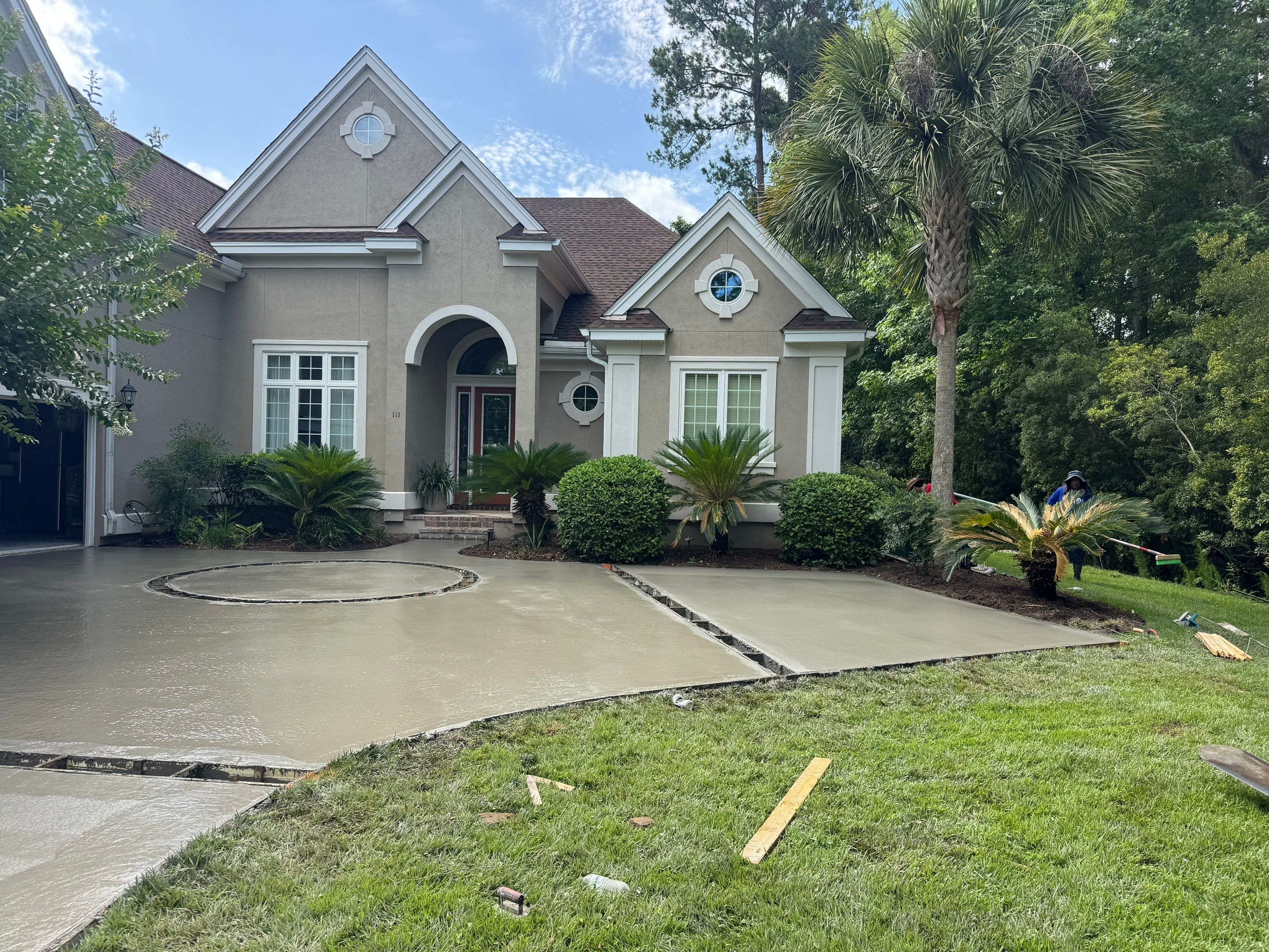 Custom Concrete Driveway and Decorative Paver Installation in Bluffton