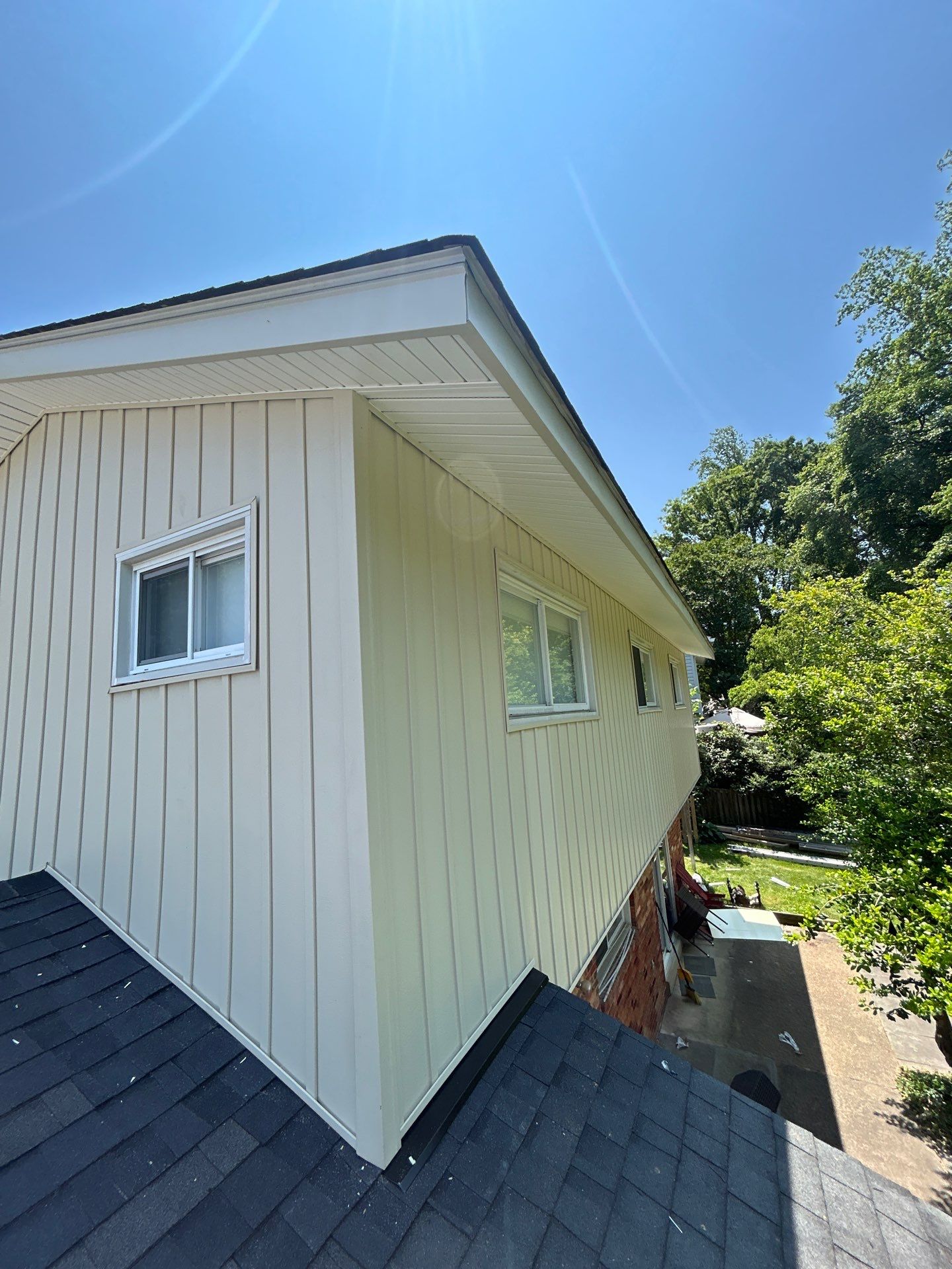 Fairfax: Residential Siding Replacement with CertainTeed 8" Board and Batten Siding in Desert Tan by RM Banning, Inc.