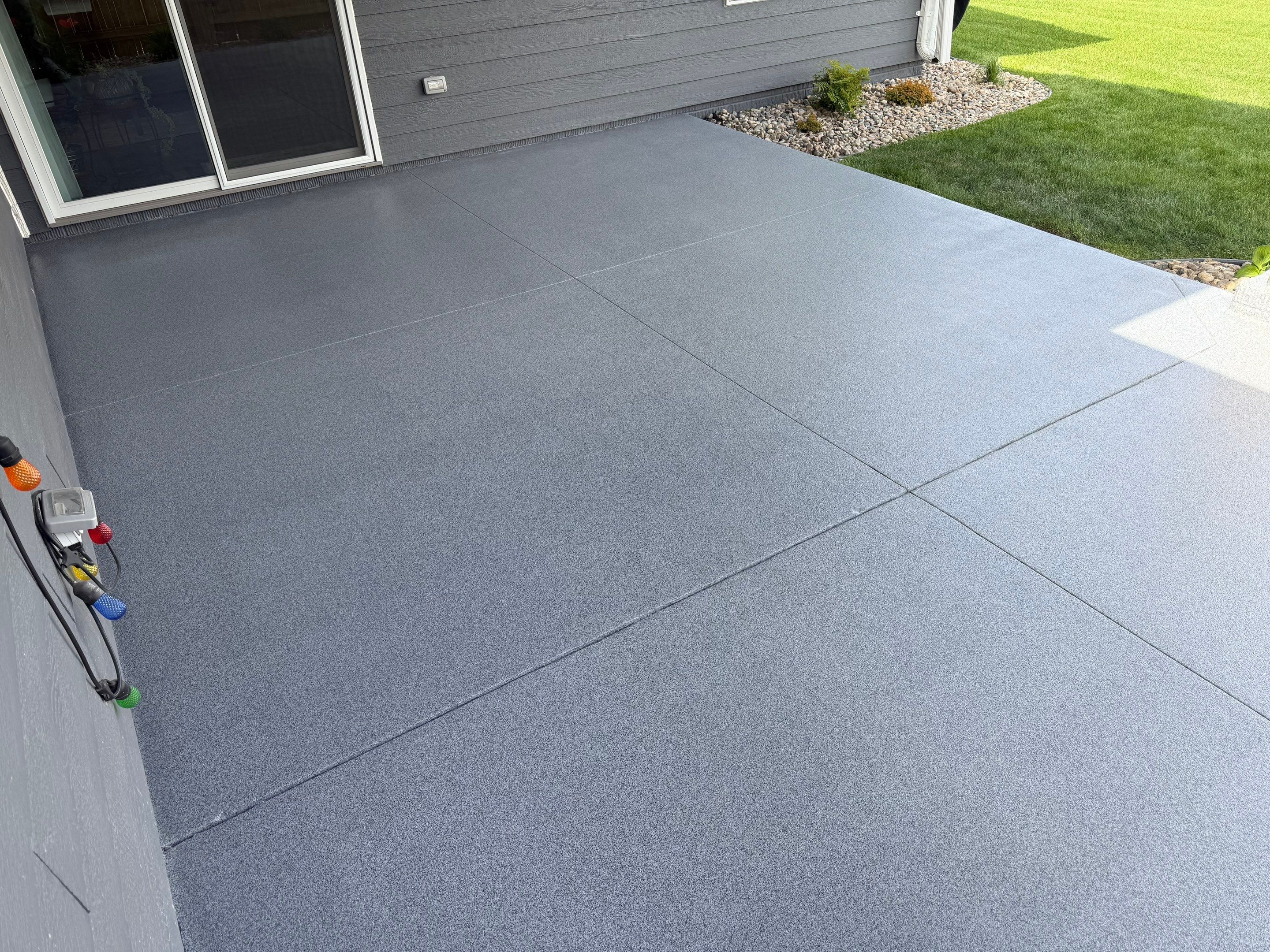 Decorative Flake Concrete Coating for Sioux Falls Porch and Patio by Select Painting, Coatings & Garage Cabinets