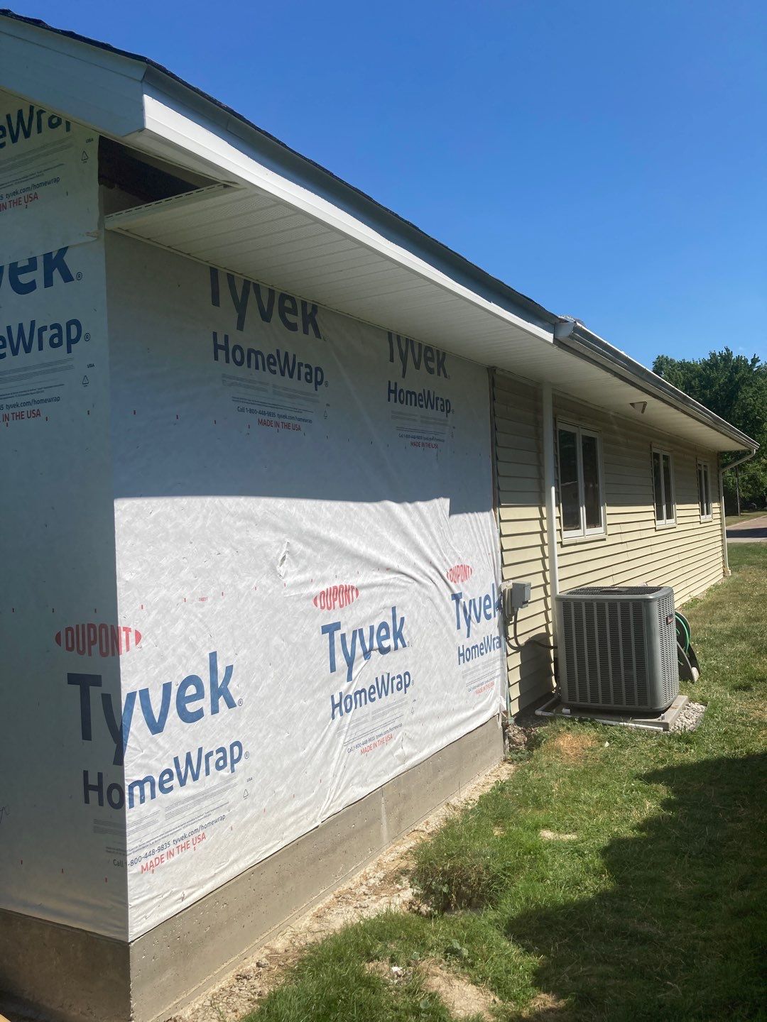Gutter Installation using 5" Seamless Aluminum Gutters by Absolute Roofing and Construction